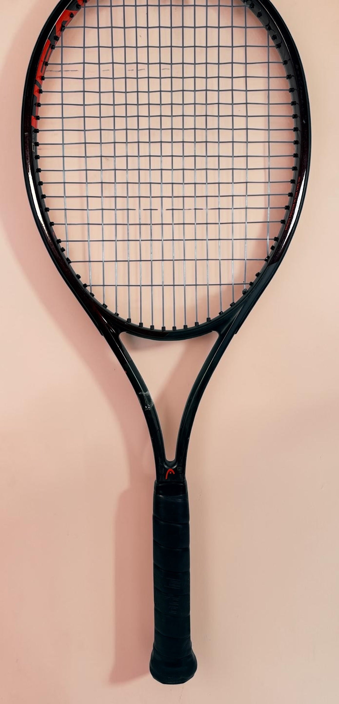 HEAD Prestige MP tennis racquet with Auxetic technology. Pre-owned and strung with visible cosmetic wear. Premium control racquet for experienced players.