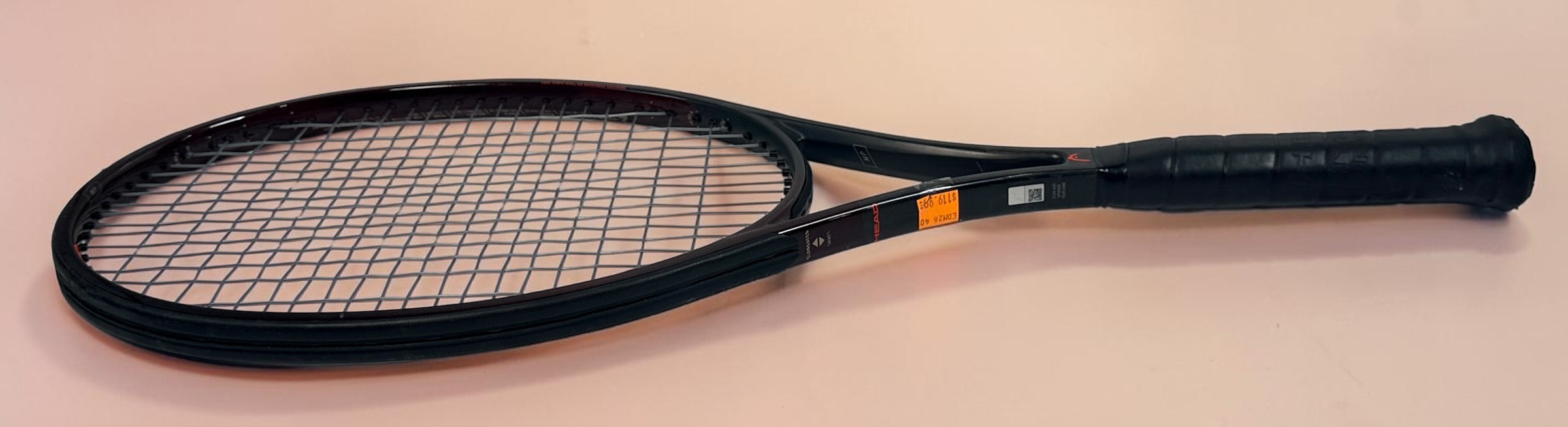 HEAD Prestige MP tennis racquet with Auxetic technology. Pre-owned and strung with visible cosmetic wear. Premium control racquet for experienced players.
