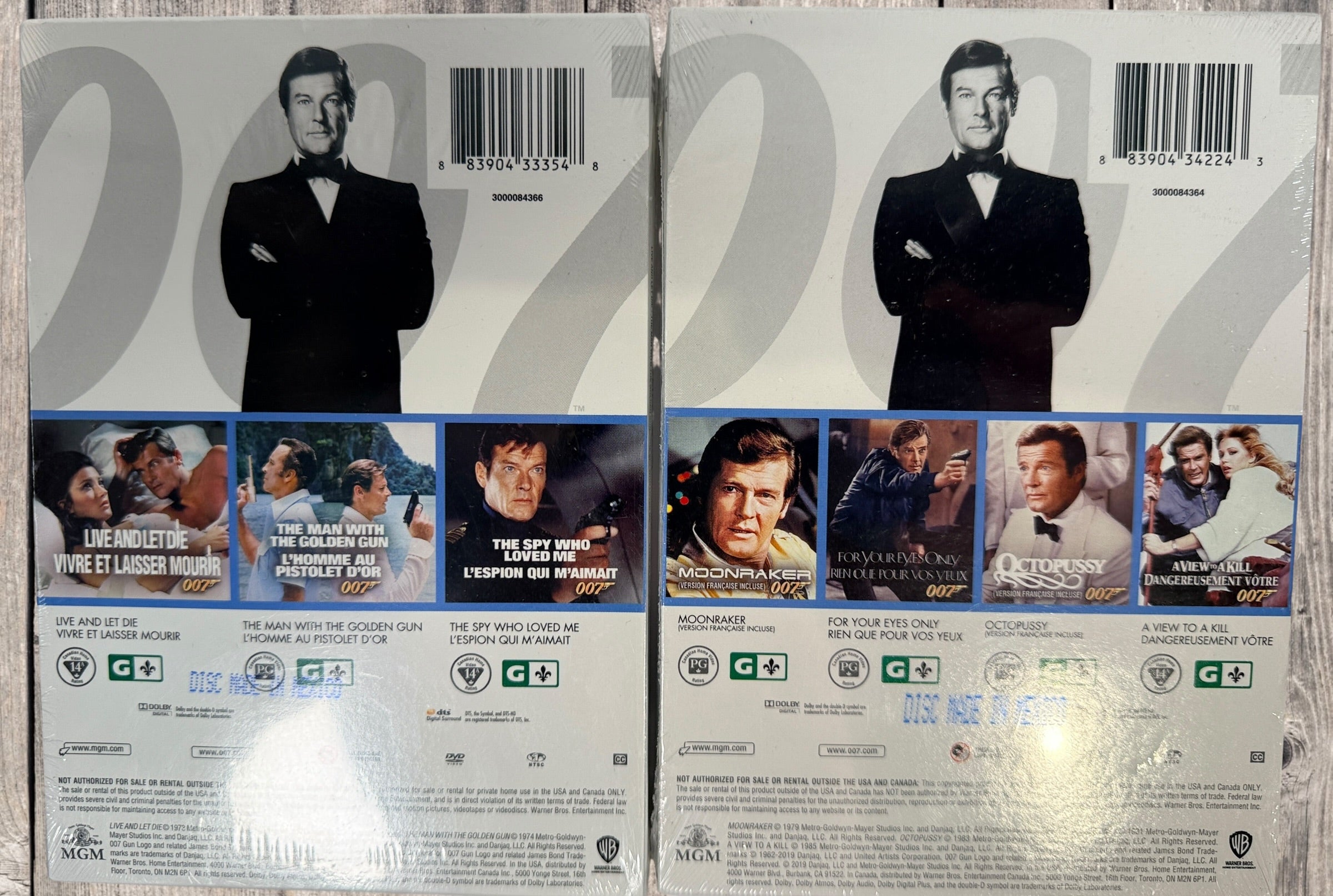 Sealed Roger Moore James Bond DVD collection Vol 1 and 2 including seven classic 007 films. MGM release with English and French versions. Collector set.