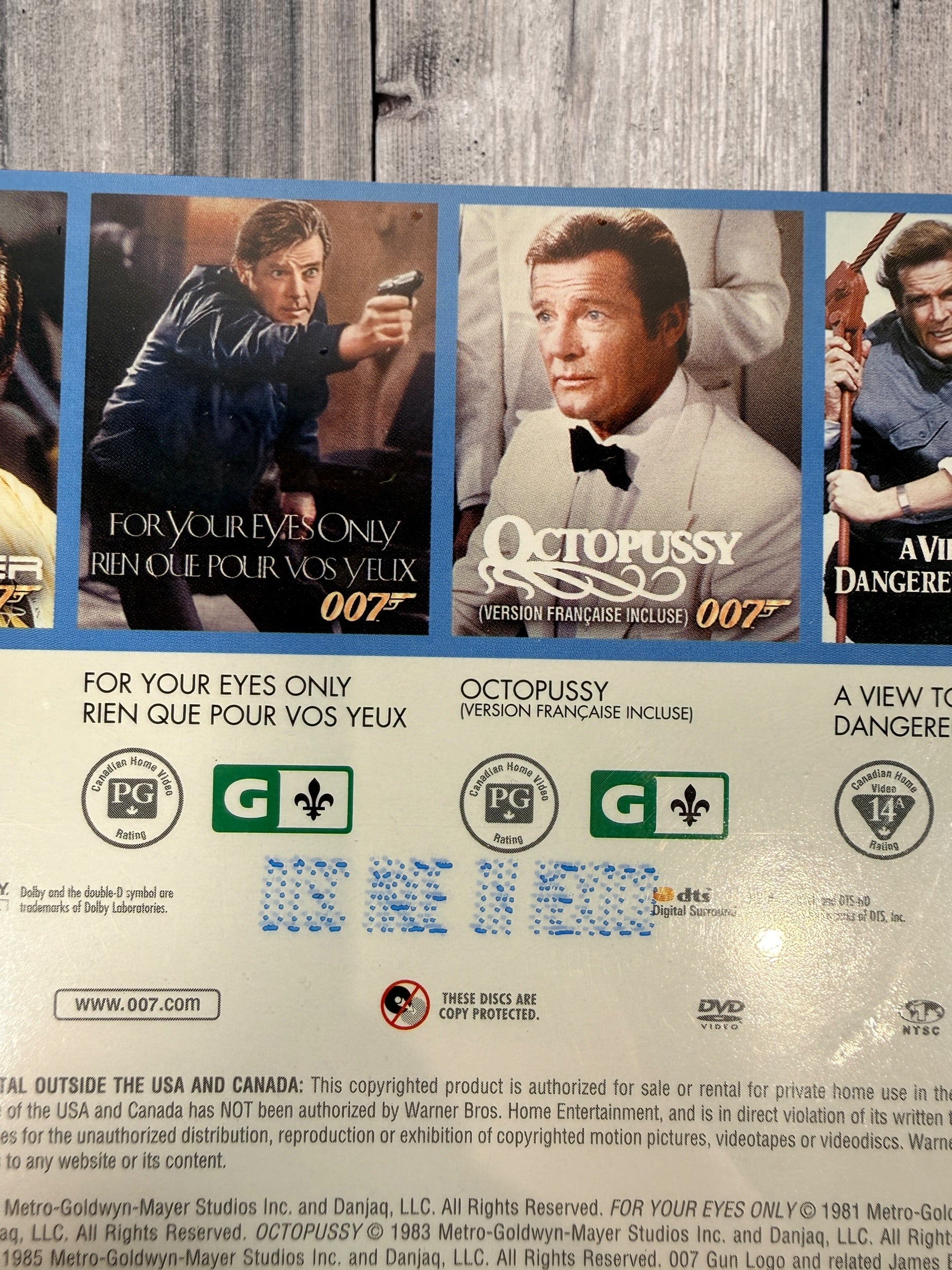 Sealed Roger Moore James Bond DVD collection Vol 1 and 2 including seven classic 007 films. MGM release with English and French versions. Collector set.