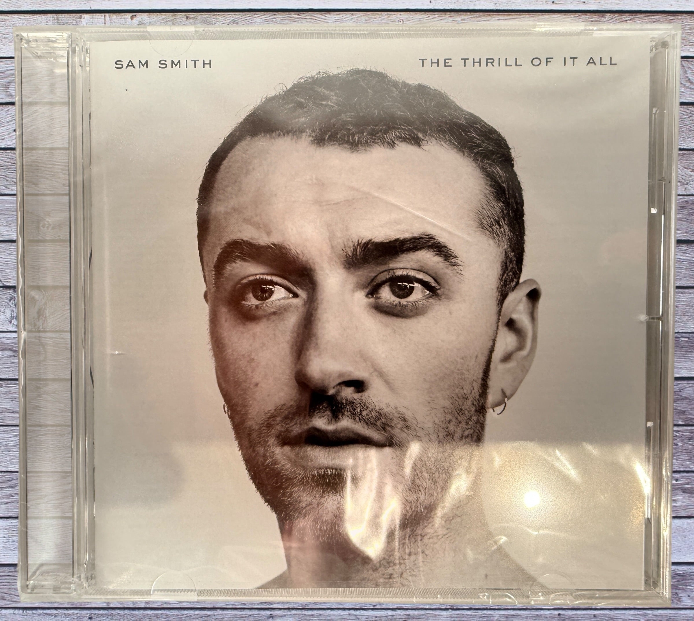 Japanese edition of Sam Smith The Thrill Of It All CD with bonus tracks Leader of the Pack and Blind Eye. Clean copy with original artwork and jewel case.