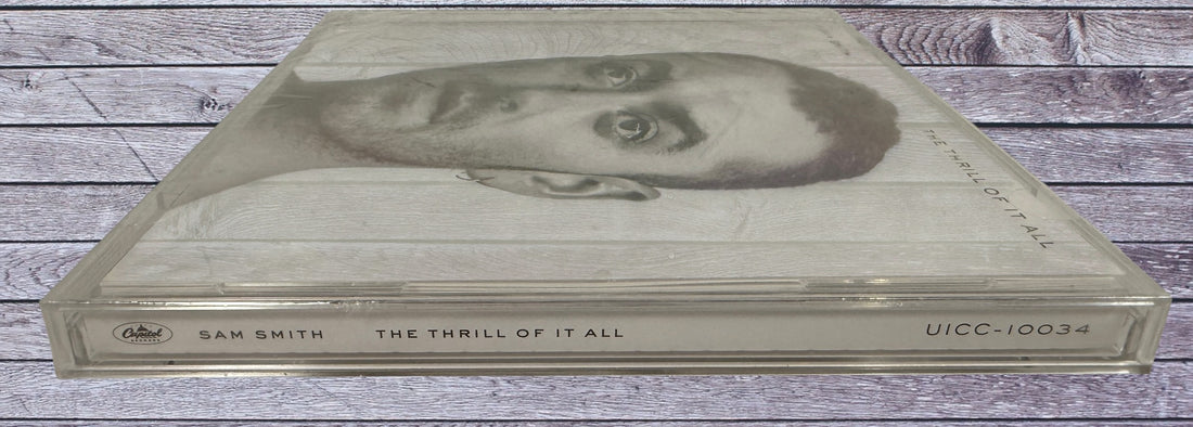 Japanese edition of Sam Smith The Thrill Of It All CD with bonus tracks Leader of the Pack and Blind Eye. Clean copy with original artwork and jewel case.