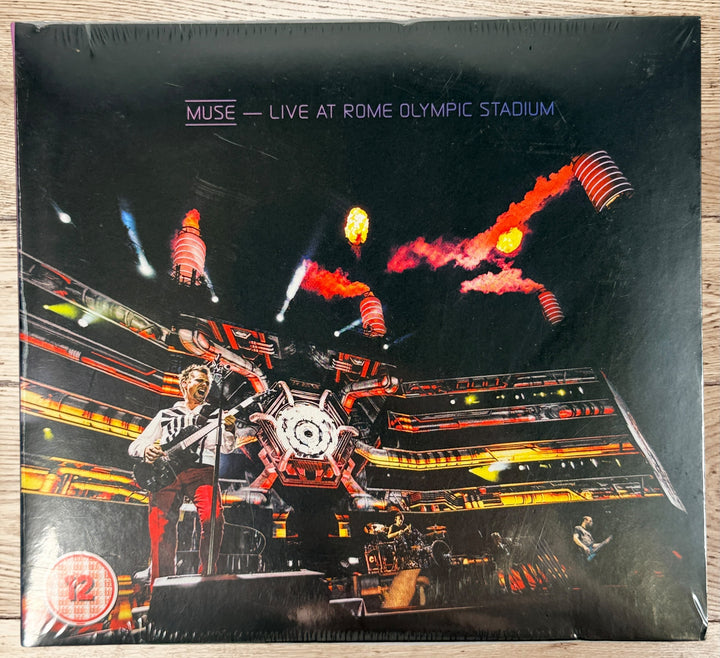 Sealed Muse Live at Rome Olympic Stadium CD + DVD set. Official Warner UK release with DTS 5.1 surround. Concert tour edition, NTSC all region.