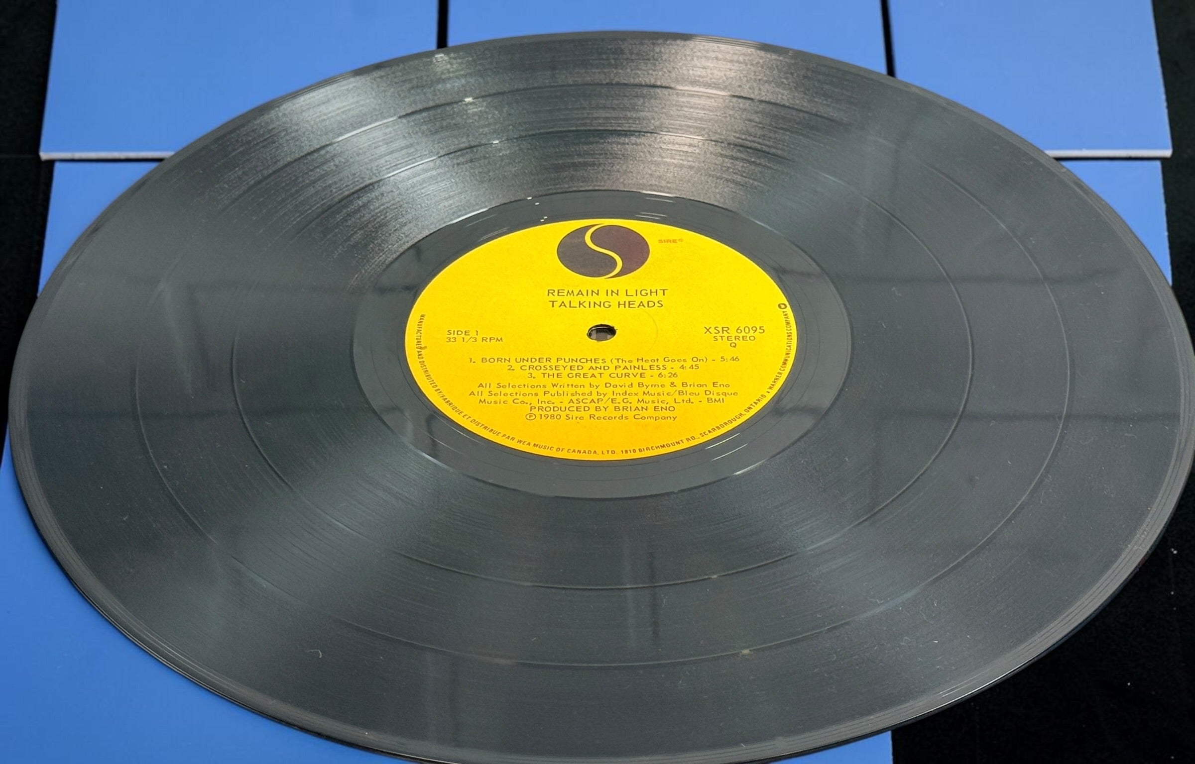 1980 Talking Heads Remain in Light Canadian vinyl LP XSR 6095 on Sire Records with original illustrated inner sleeve and lyric insert.