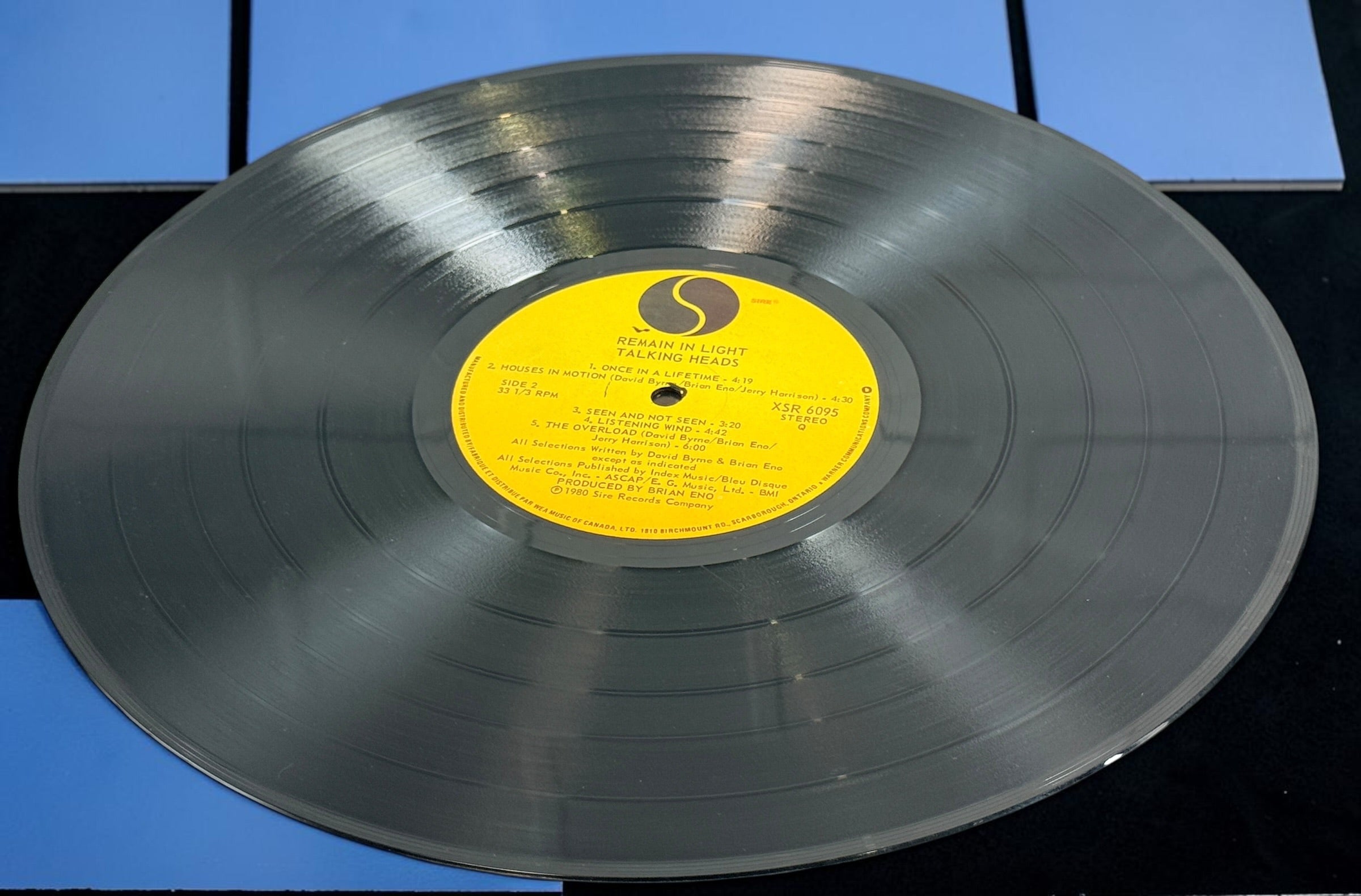 1980 Talking Heads Remain in Light Canadian vinyl LP XSR 6095 on Sire Records with original illustrated inner sleeve and lyric insert.
