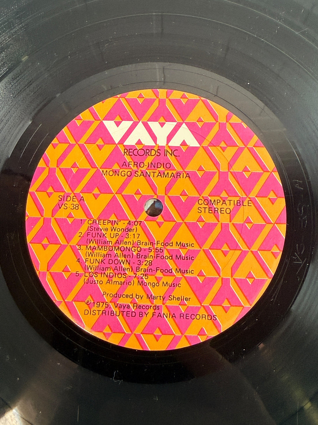 1975 Mongo Santamaria Afro-Indio vinyl LP on Vaya Records VS-38, distributed by Fania. Vintage Latin jazz and Afro-Cuban funk record.