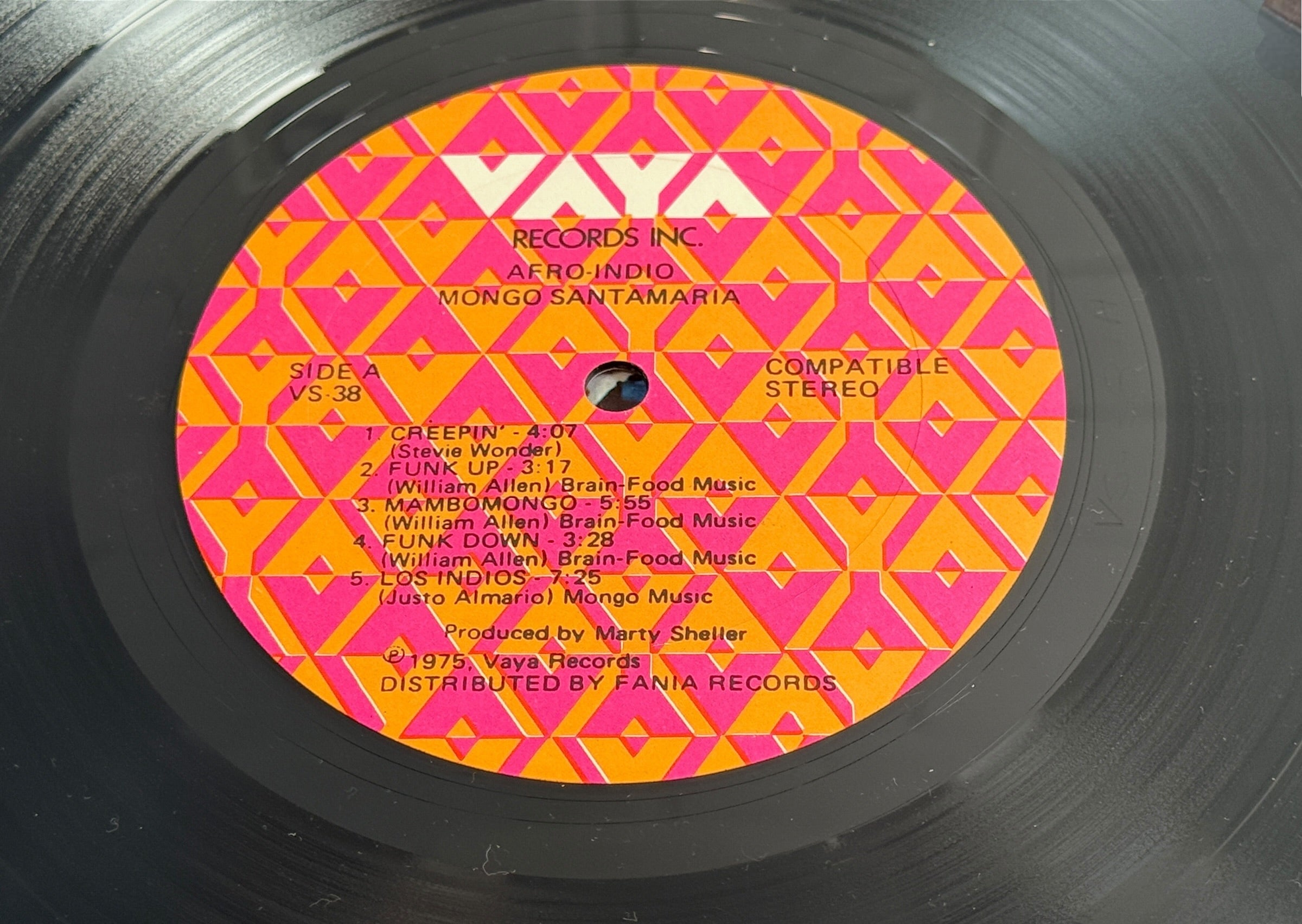 1975 Mongo Santamaria Afro-Indio vinyl LP on Vaya Records VS-38, distributed by Fania. Vintage Latin jazz and Afro-Cuban funk record.