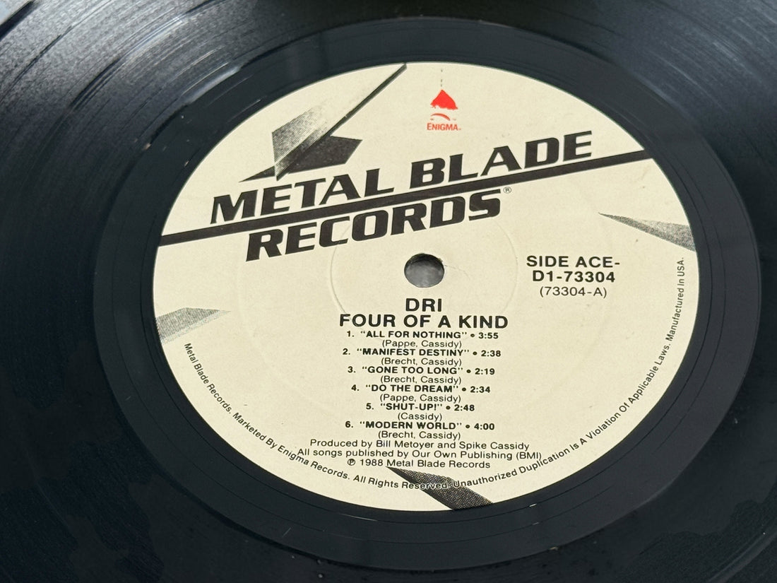 Original 1988 D.R.I. 4 of a Kind vinyl LP on Metal Blade Records, D1-73304. Classic crossover thrash and hardcore punk collectible.