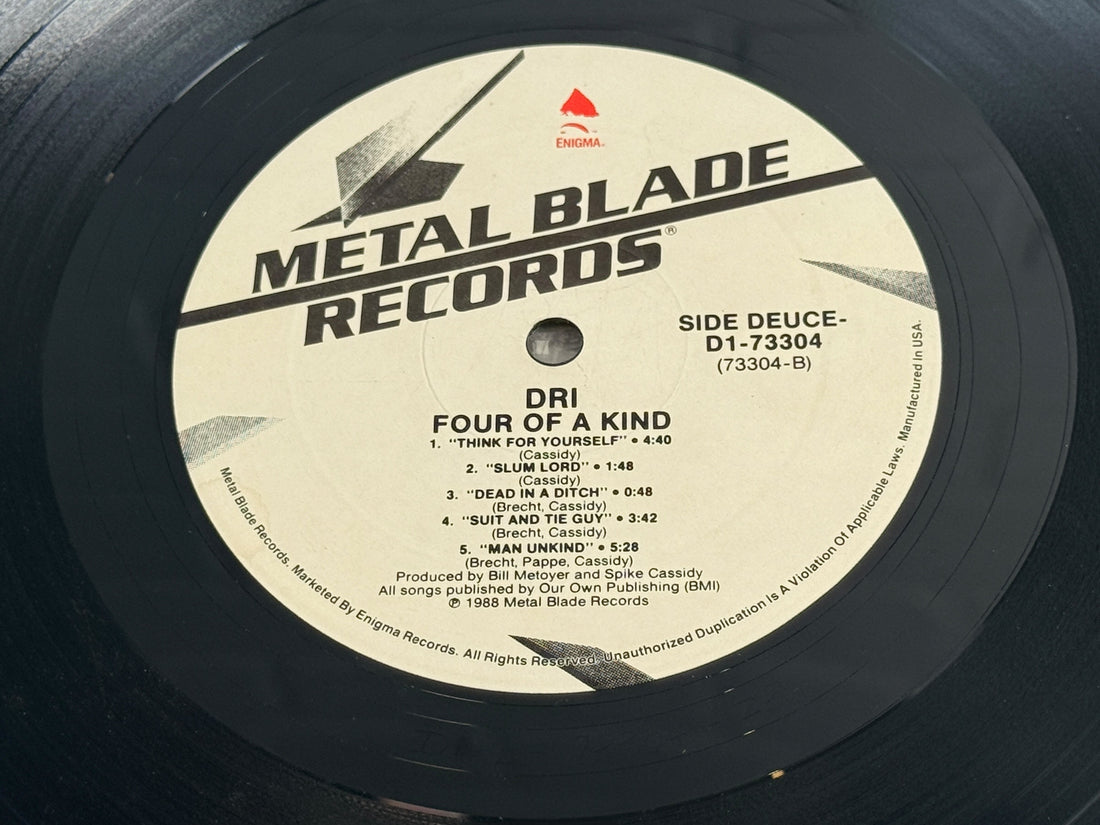 Original 1988 D.R.I. 4 of a Kind vinyl LP on Metal Blade Records, D1-73304. Classic crossover thrash and hardcore punk collectible.