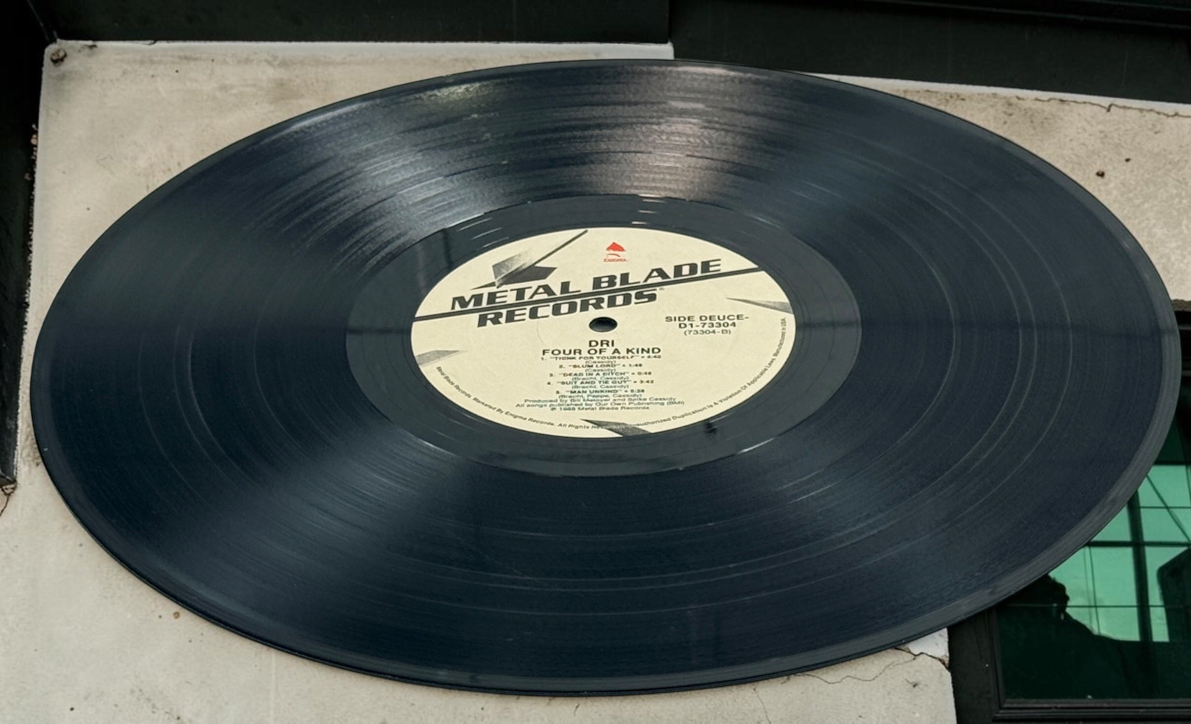 Original 1988 D.R.I. 4 of a Kind vinyl LP on Metal Blade Records, D1-73304. Classic crossover thrash and hardcore punk collectible.