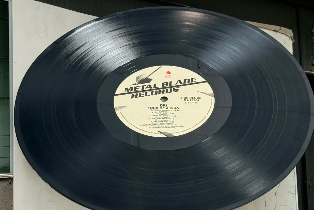 Original 1988 D.R.I. 4 of a Kind vinyl LP on Metal Blade Records, D1-73304. Classic crossover thrash and hardcore punk collectible.