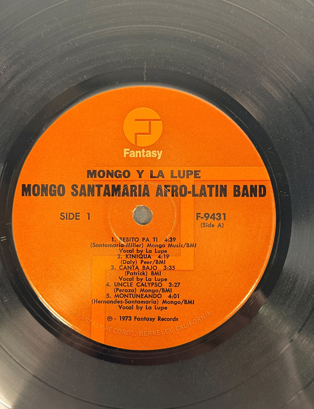 Discover Mongo y La Lupe, a 1973 pressing featuring Mongo Santamaria’s Afro-Latin Band and La Lupe. Vibrant Latin jazz and Afro-Cuban rhythms on vintage vinyl.