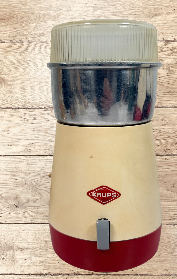 Vintage Krups Type 808 coffee grinder in cream and red. Tested working 110V model from the 1960s–70s. Classic German retro kitchen appliance.