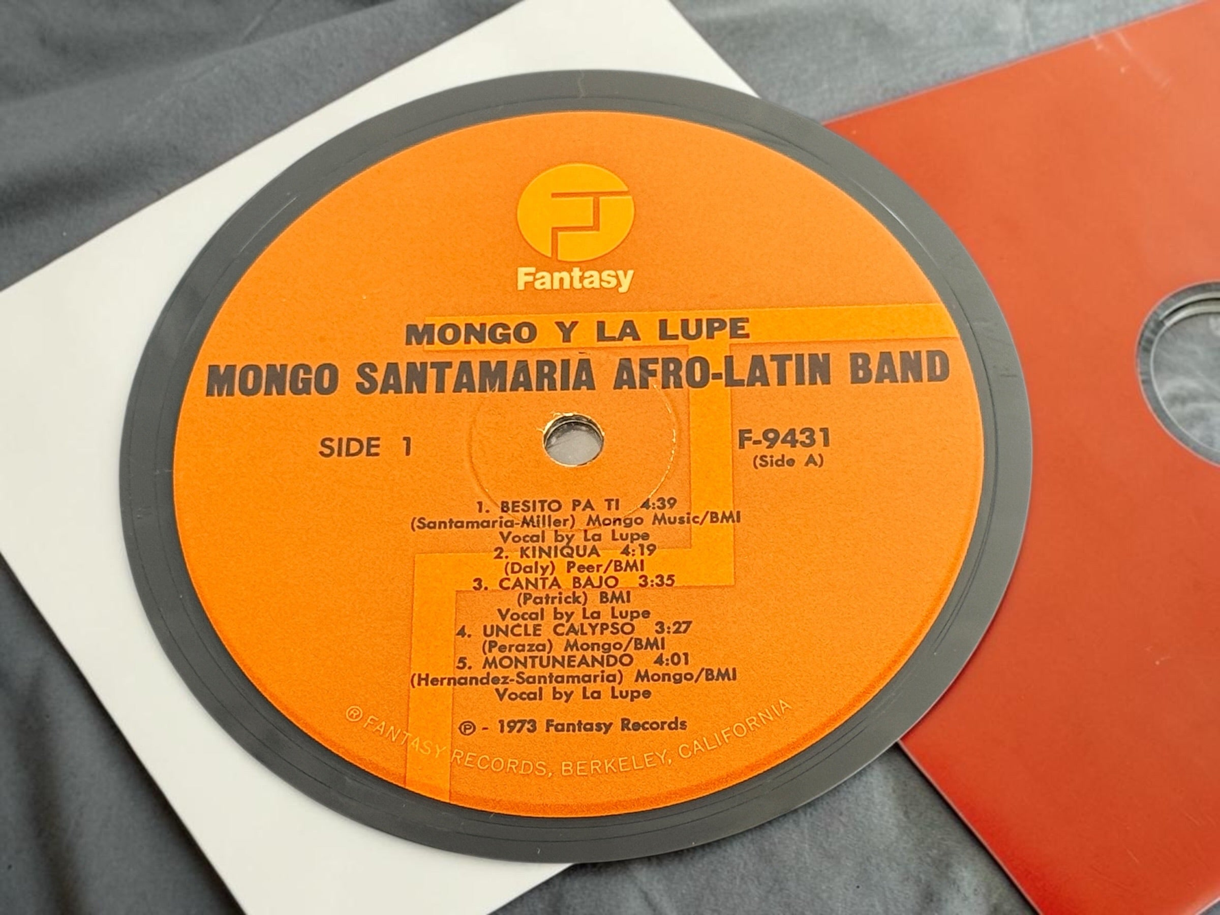 Discover Mongo y La Lupe, a 1973 pressing featuring Mongo Santamaria’s Afro-Latin Band and La Lupe. Vibrant Latin jazz and Afro-Cuban rhythms on vintage vinyl.