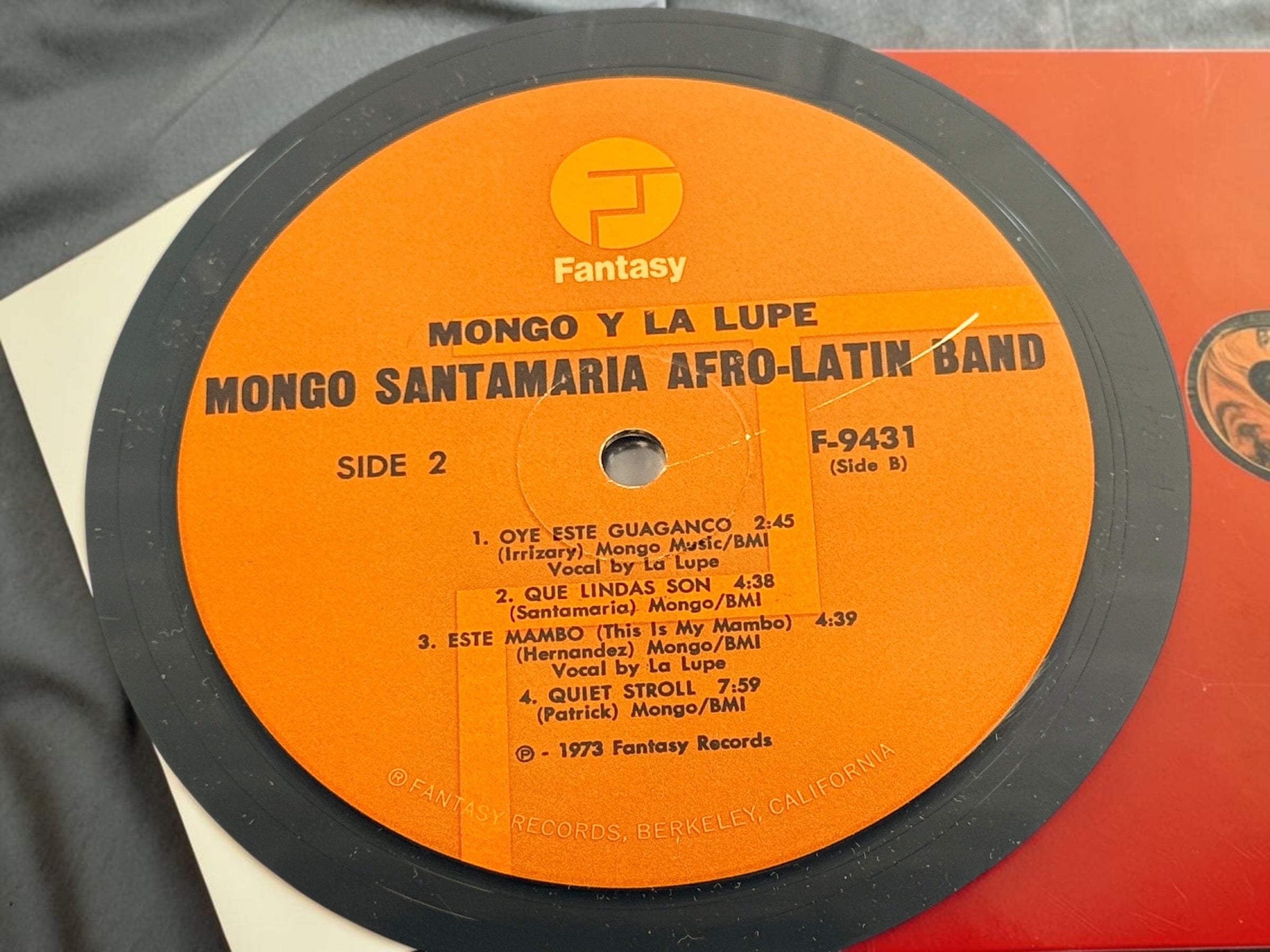 Discover Mongo y La Lupe, a 1973 pressing featuring Mongo Santamaria’s Afro-Latin Band and La Lupe. Vibrant Latin jazz and Afro-Cuban rhythms on vintage vinyl.