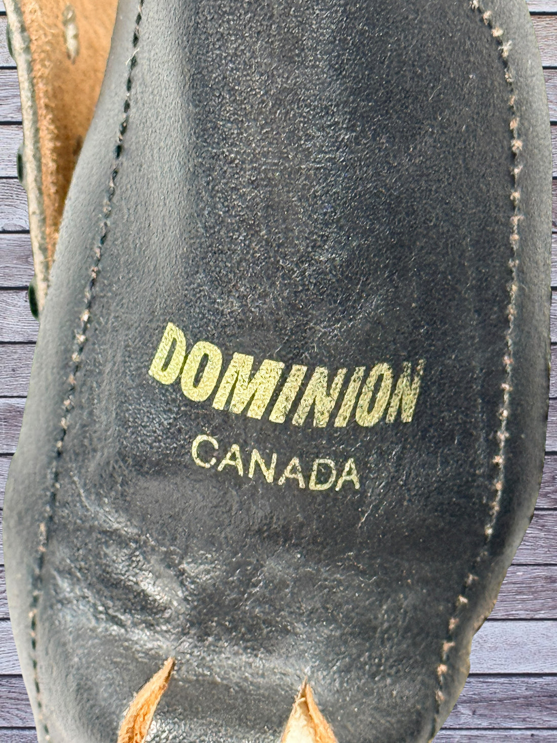 Vintage Dominion Canada leather roller skates, black quad setup with original Dominion Precision wheels. Classic rink style, estimated men’s size 10.