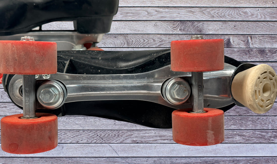 Vintage Dominion Canada leather roller skates, black quad setup with original Dominion Precision wheels. Classic rink style, estimated men’s size 10.