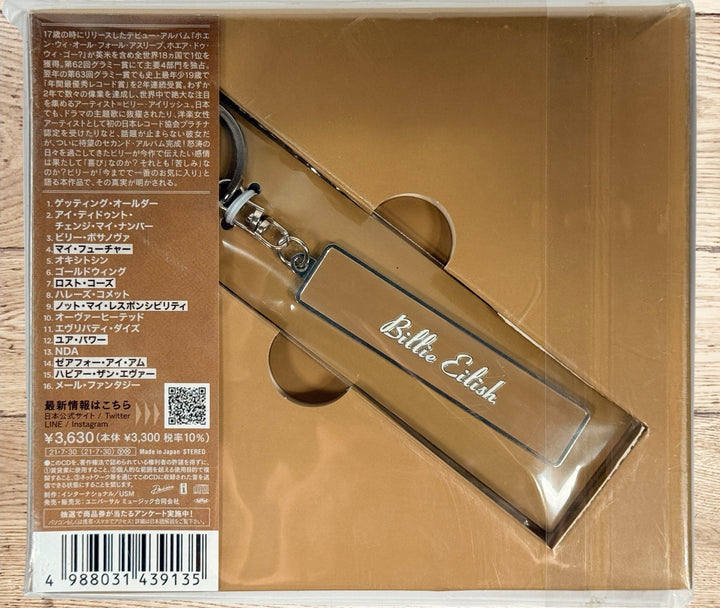 Sealed Billie Eilish Happier Than Ever Japan deluxe CD with bonus keychain. Limited UICS-9172 edition with obi strip. Collectible import pressing.