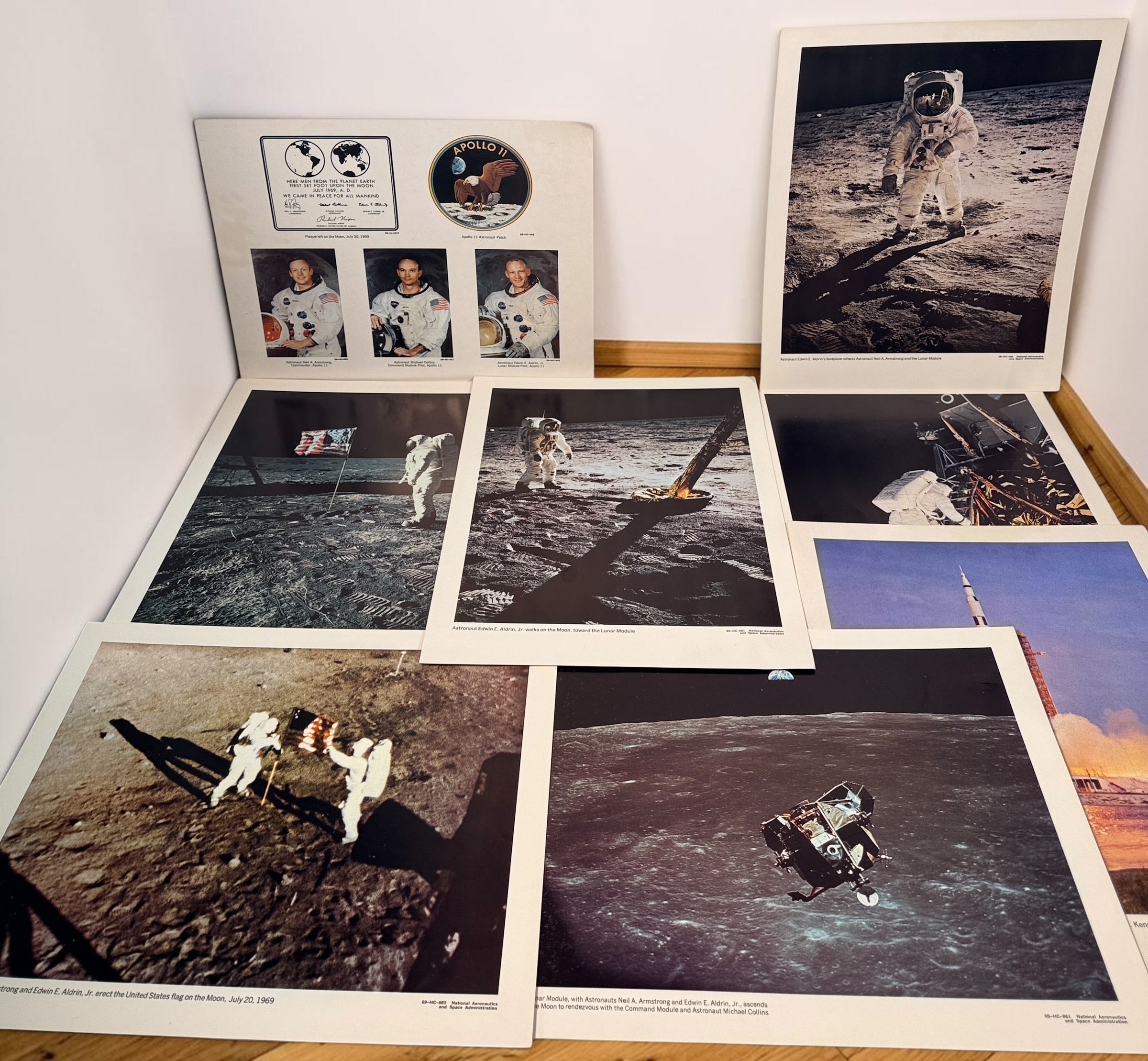 Vintage NASA Apollo lithograph collection with 19 official 11x14 prints and original U.S. Government Printing Office mailing envelope. Apollo 8–11.