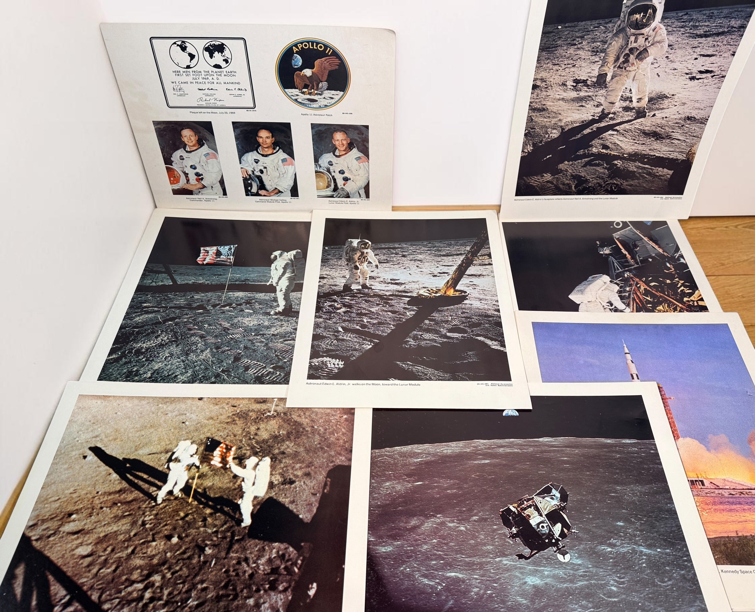Vintage NASA Apollo lithograph collection with 19 official 11x14 prints and original U.S. Government Printing Office mailing envelope. Apollo 8–11.