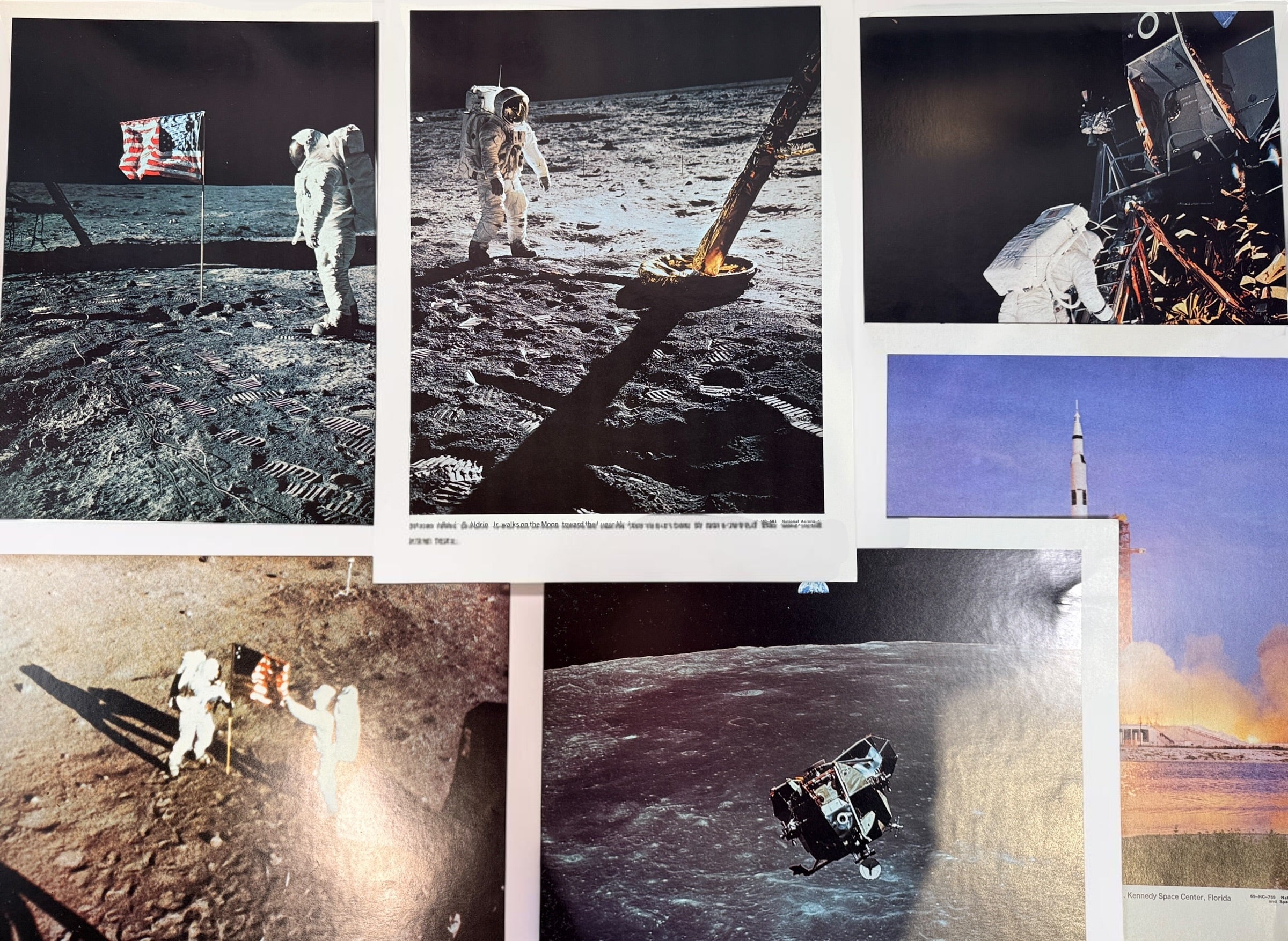 Vintage NASA Apollo lithograph collection with 19 official 11x14 prints and original U.S. Government Printing Office mailing envelope. Apollo 8–11.