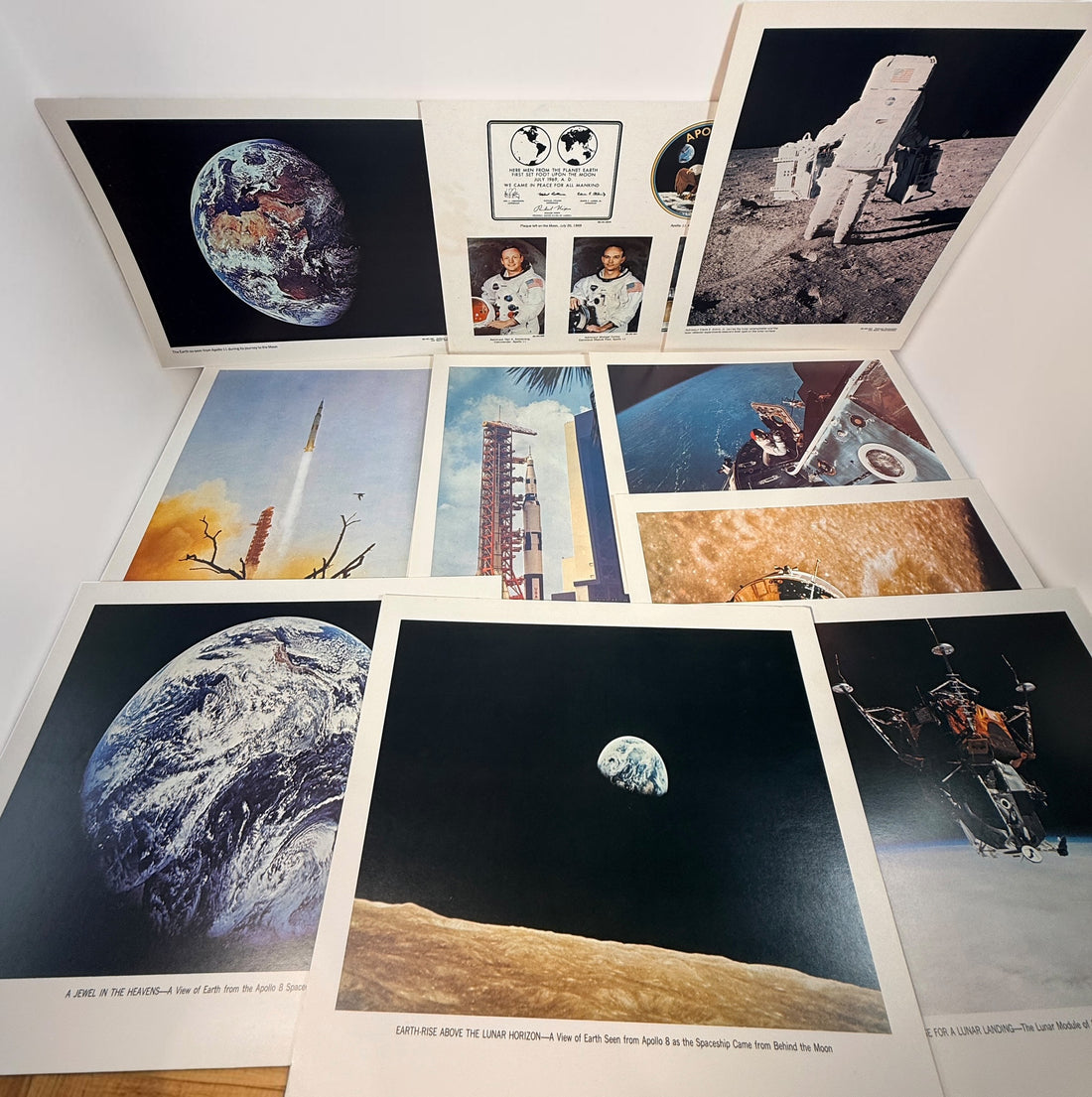 Vintage NASA Apollo lithograph collection with 19 official 11x14 prints and original U.S. Government Printing Office mailing envelope. Apollo 8–11.