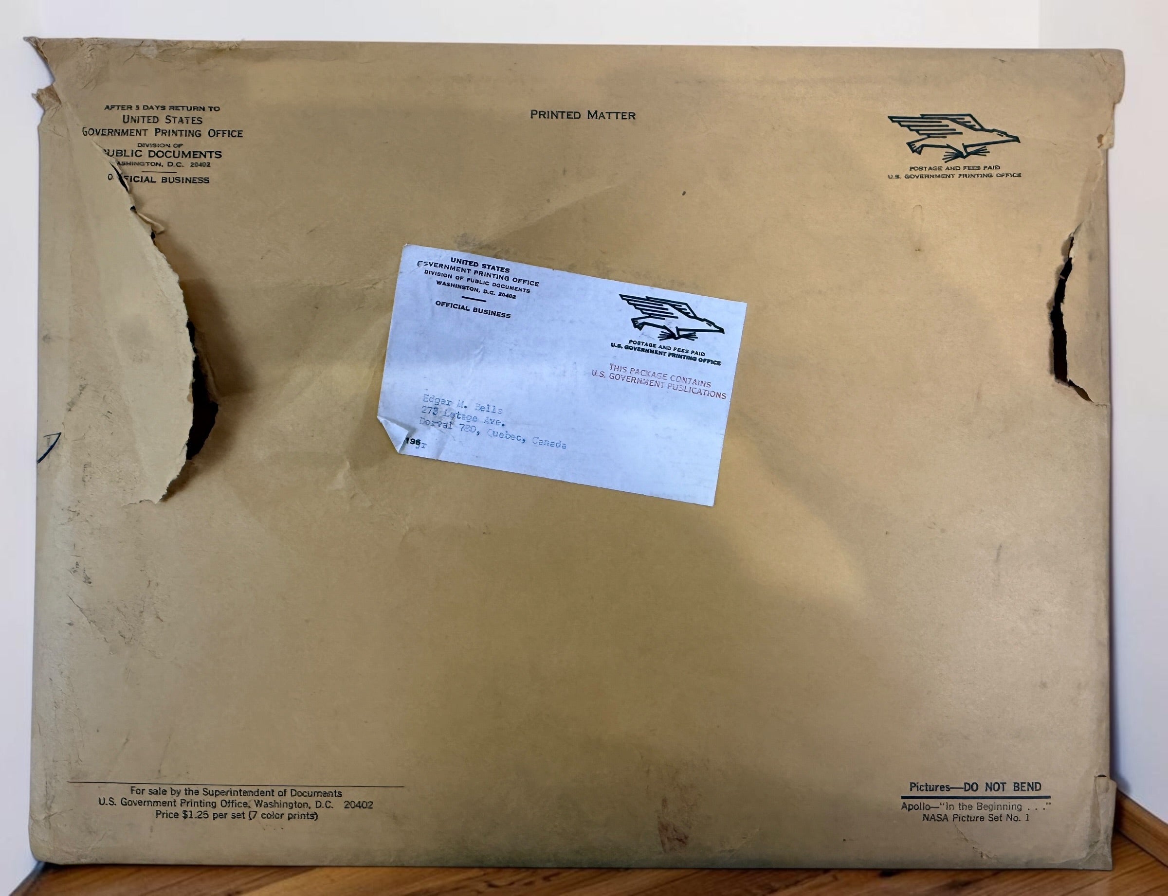 Vintage NASA Apollo lithograph collection with 19 official 11x14 prints and original U.S. Government Printing Office mailing envelope. Apollo 8–11.
