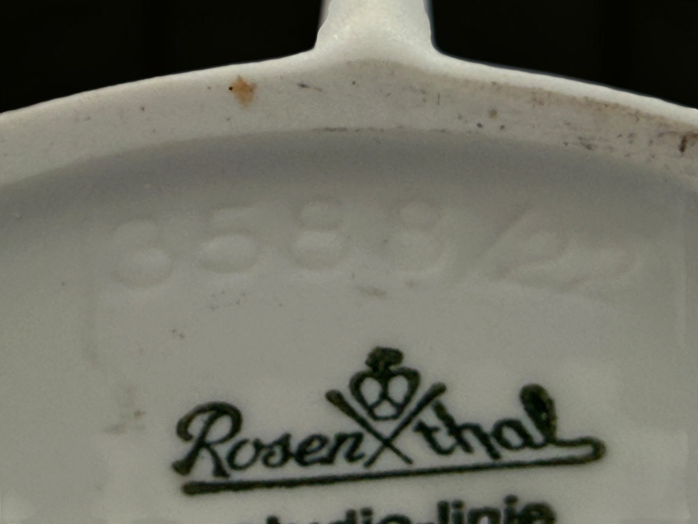 Vintage Rosenthal Studio-Linie German bisque porcelain vase with sculptural leaf relief and matte white modernist design, likely dating to the 1970s