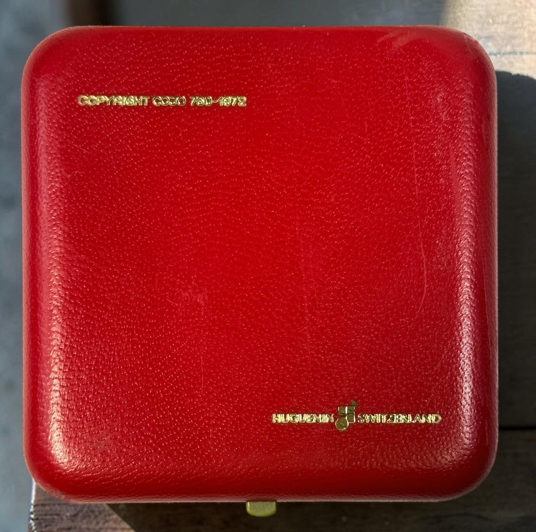 Official 1976 Montréal Olympics bronze medallion by Huguenin Switzerland with original red case and numbered COA #013824. Vintage Olympic collectible.