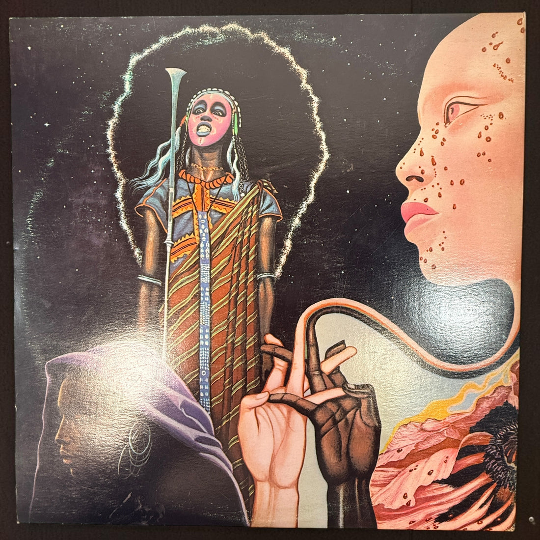 Vintage Miles Davis Bitches Brew Canadian Columbia GP 26 double vinyl LP with iconic Mati Klarwein gatefold artwork. Classic jazz fusion.