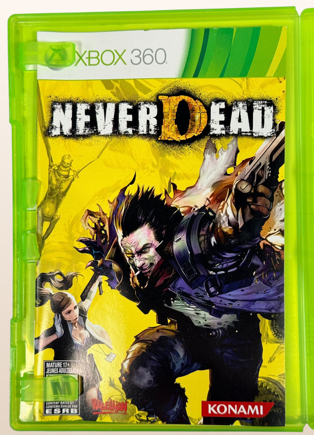 NeverDead for Xbox 360 by Konami. Cult action horror shooter with unique gameplay mechanics. Includes original case and disc in very good condition.