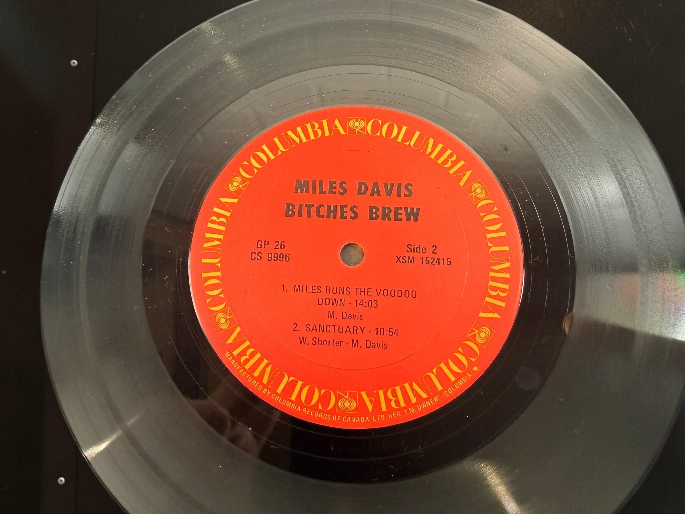 Vintage Miles Davis Bitches Brew Canadian Columbia GP 26 double vinyl LP with iconic Mati Klarwein gatefold artwork. Classic jazz fusion.