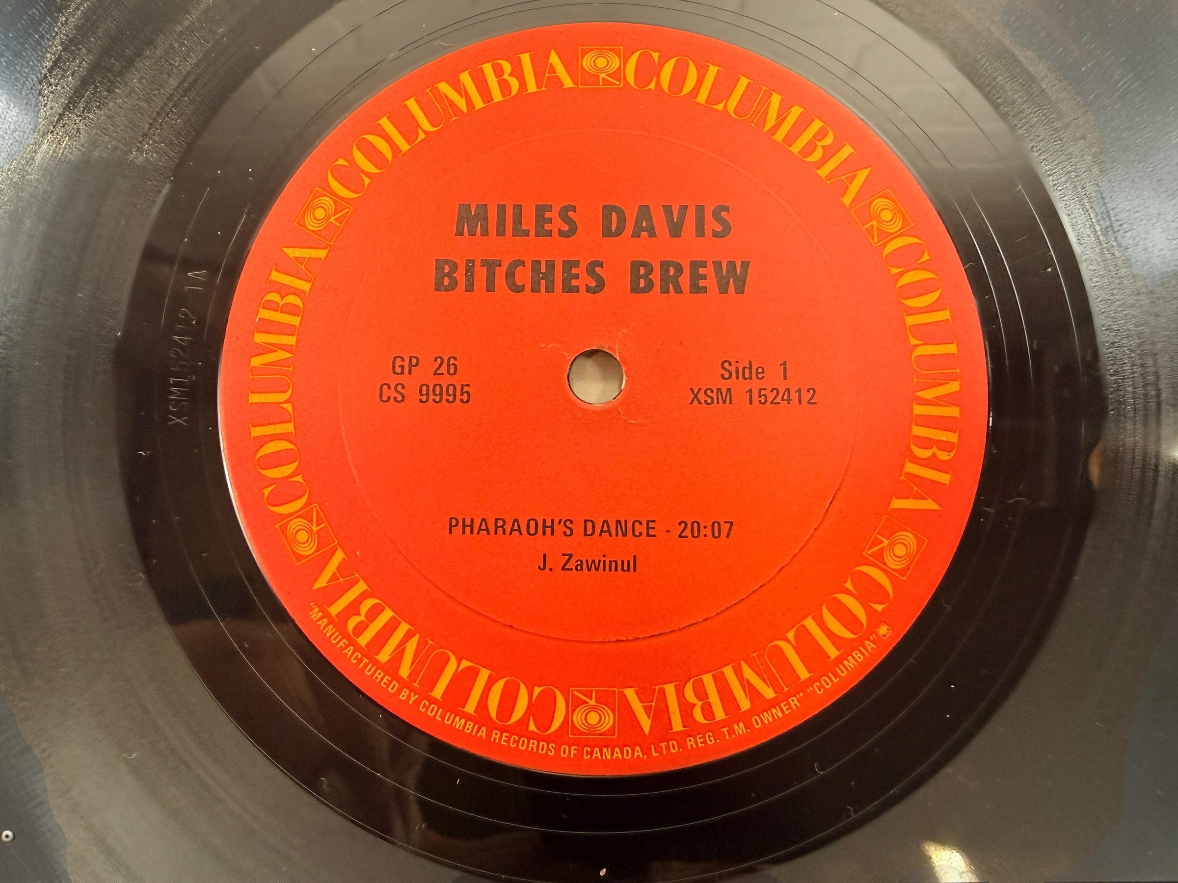 Vintage Miles Davis Bitches Brew Canadian Columbia GP 26 double vinyl LP with iconic Mati Klarwein gatefold artwork. Classic jazz fusion.