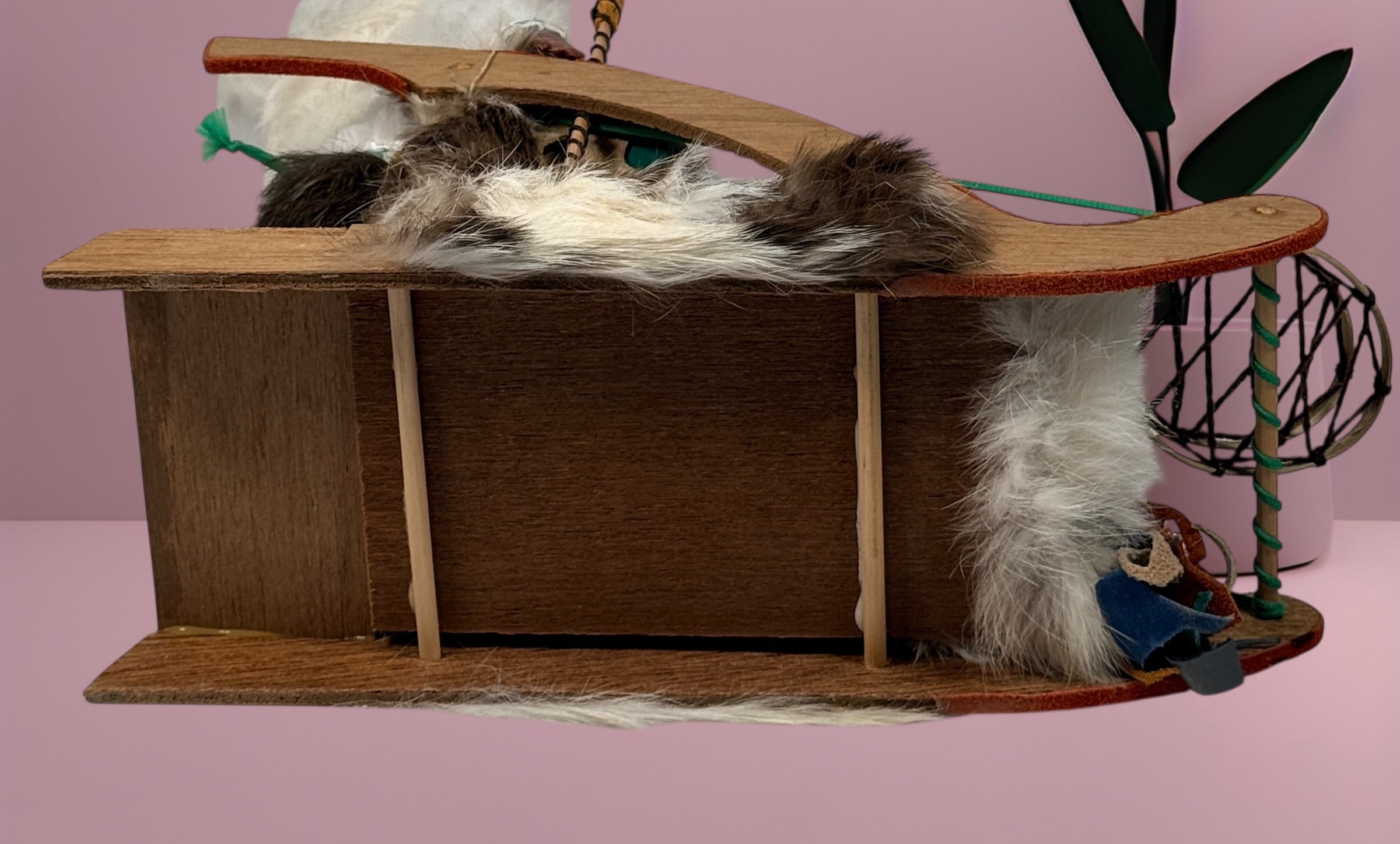 Vintage 1960s Arctic mother and child fur doll with wooden sled. Mid-century Canadiana winter décor in very good condition. Eco Depot Montreal.