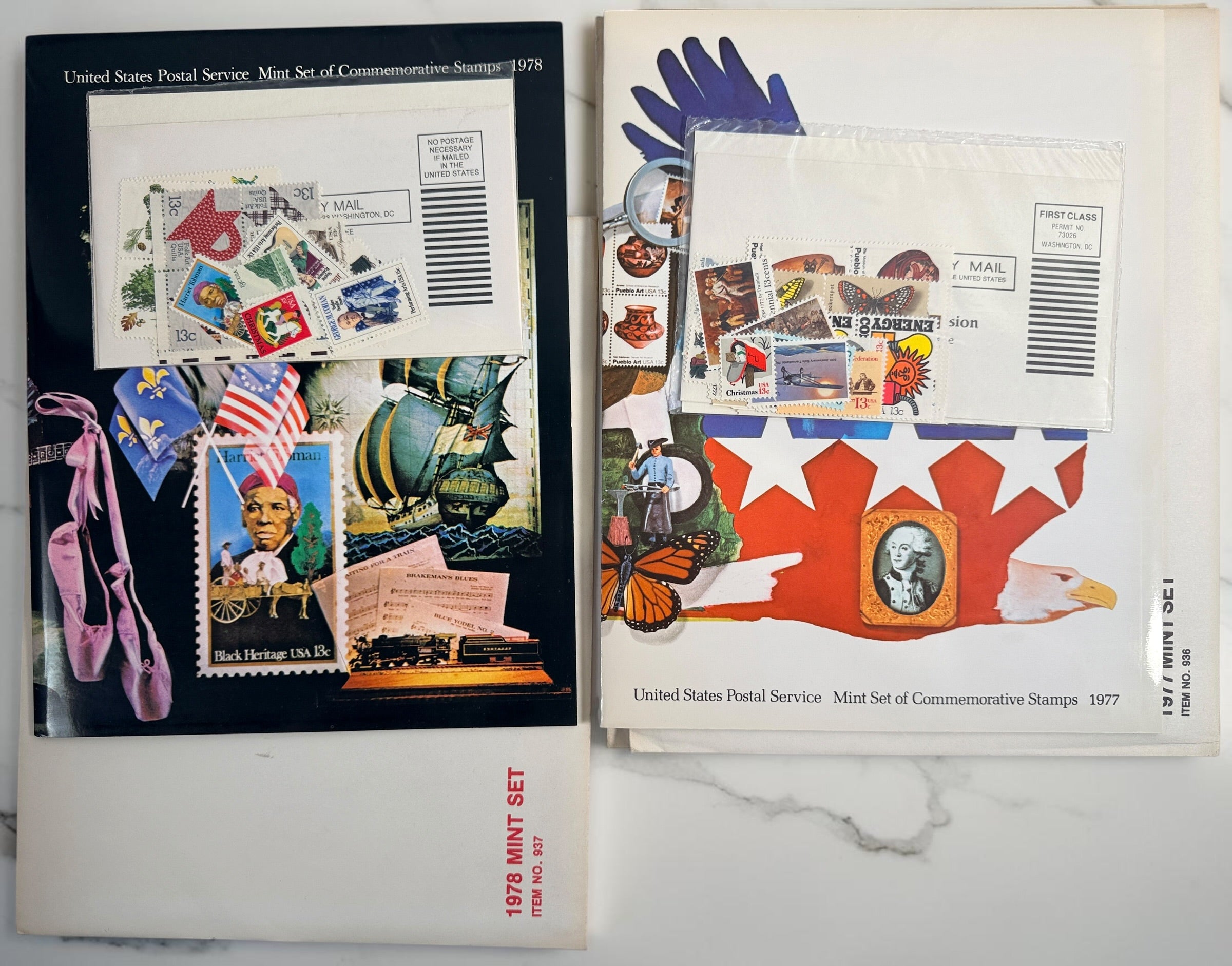 Vintage lot of 14 USPS Mint Sets of Commemorative Stamps from 1975–1979 with original stamps and presentation materials. Collectible U.S. postal history.