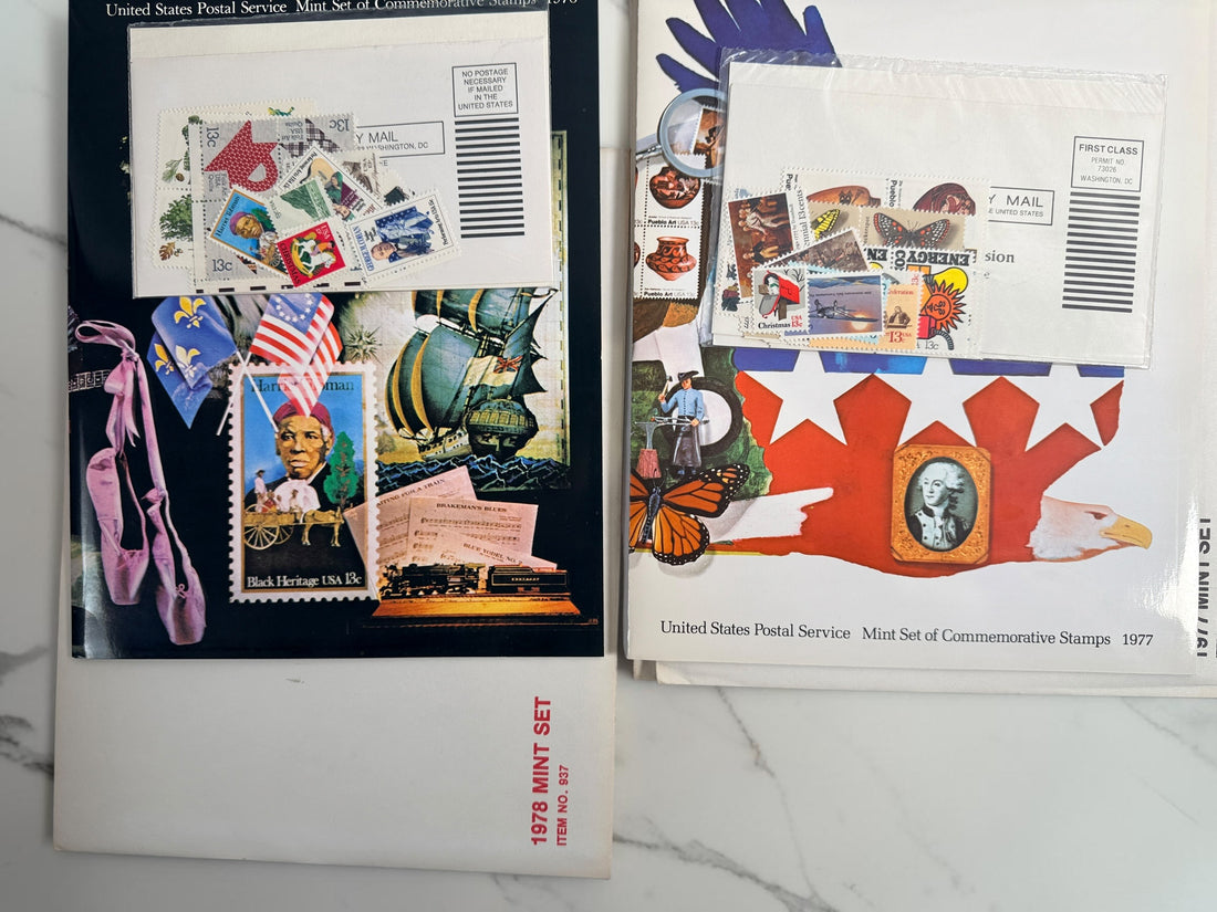 Vintage lot of 14 USPS Mint Sets of Commemorative Stamps from 1975–1979 with original stamps and presentation materials. Collectible U.S. postal history.