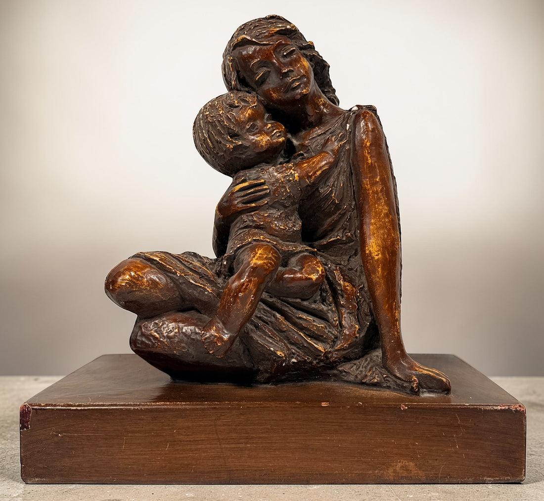Vintage mother and child sculpture with bronze and gold finish. Modernist decorative figurine, 11.5 inches tall, ideal for mid-century or contemporary décor.
