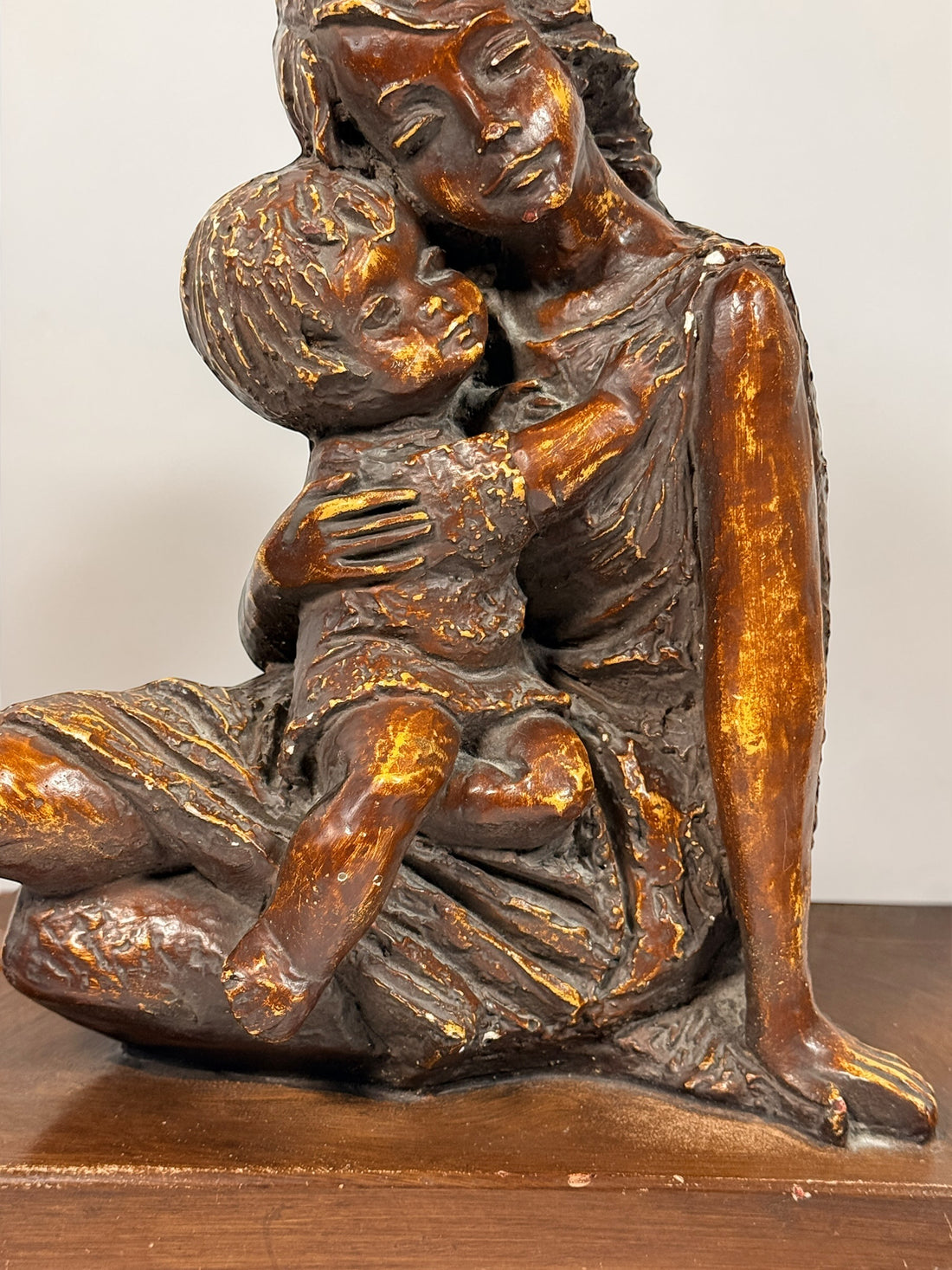 Vintage mother and child sculpture with bronze and gold finish. Modernist decorative figurine, 11.5 inches tall, ideal for mid-century or contemporary décor.