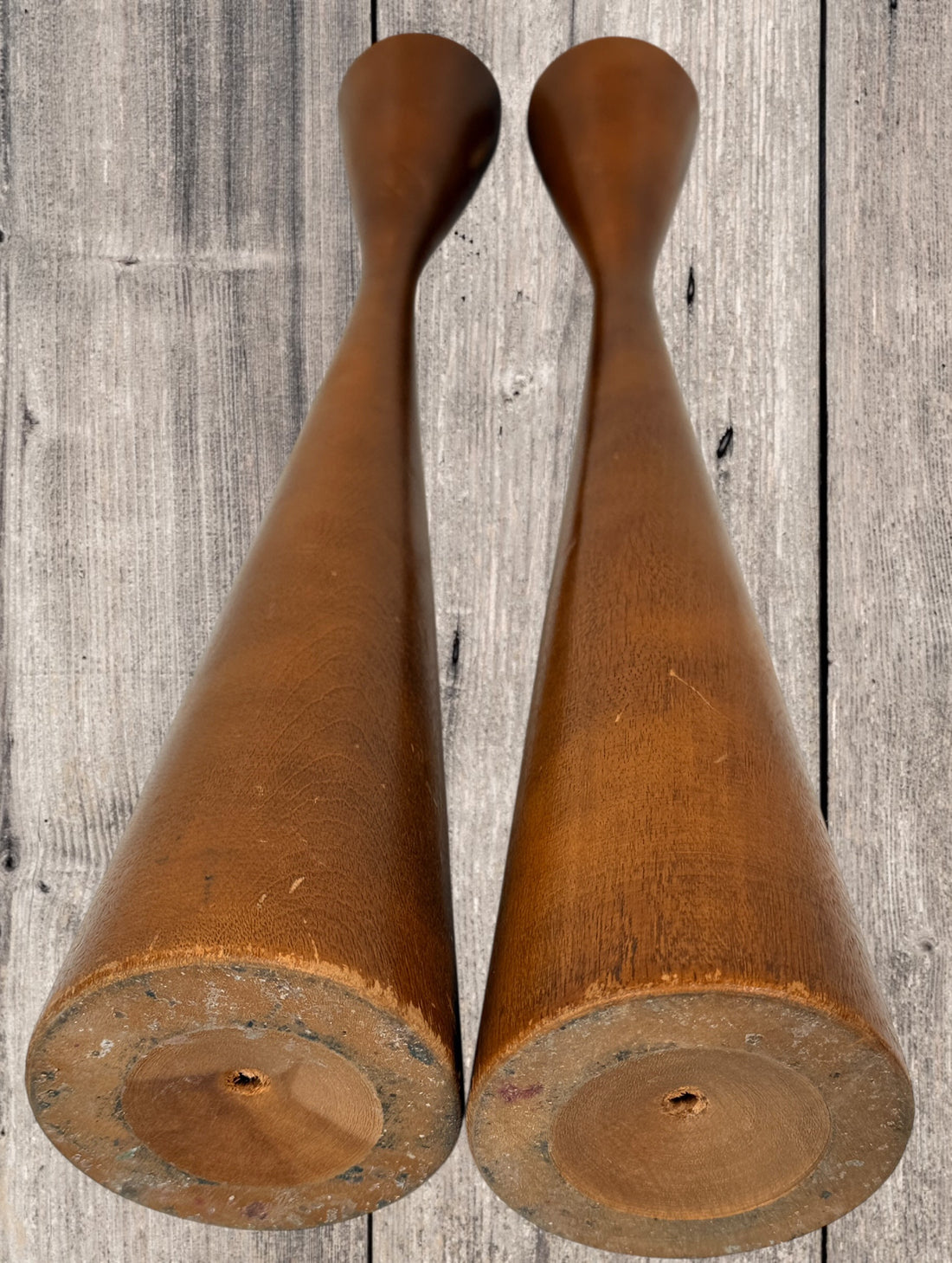 Pair of mid-century Danish modern solid teak candlesticks, Scandinavian minimalist taper candle holders with warm teak grain, perfect for vintage décor styling.