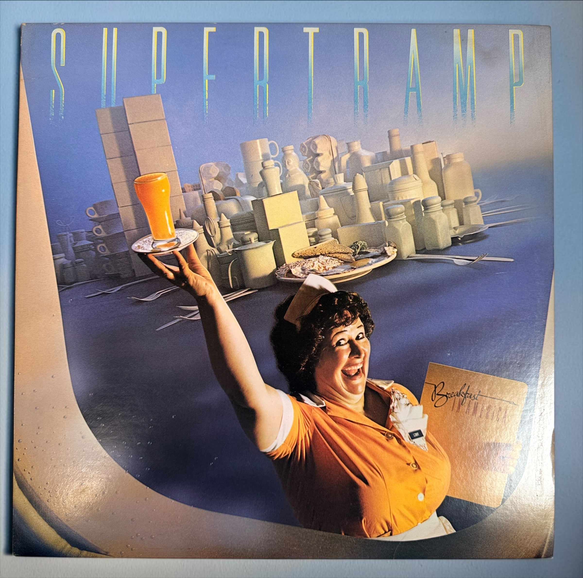 Supertramp's Breakfast in America (1979) Canadian vinyl LP on A&M Records SP-3708. Original lyric sleeve included. Vintage classic rock record.