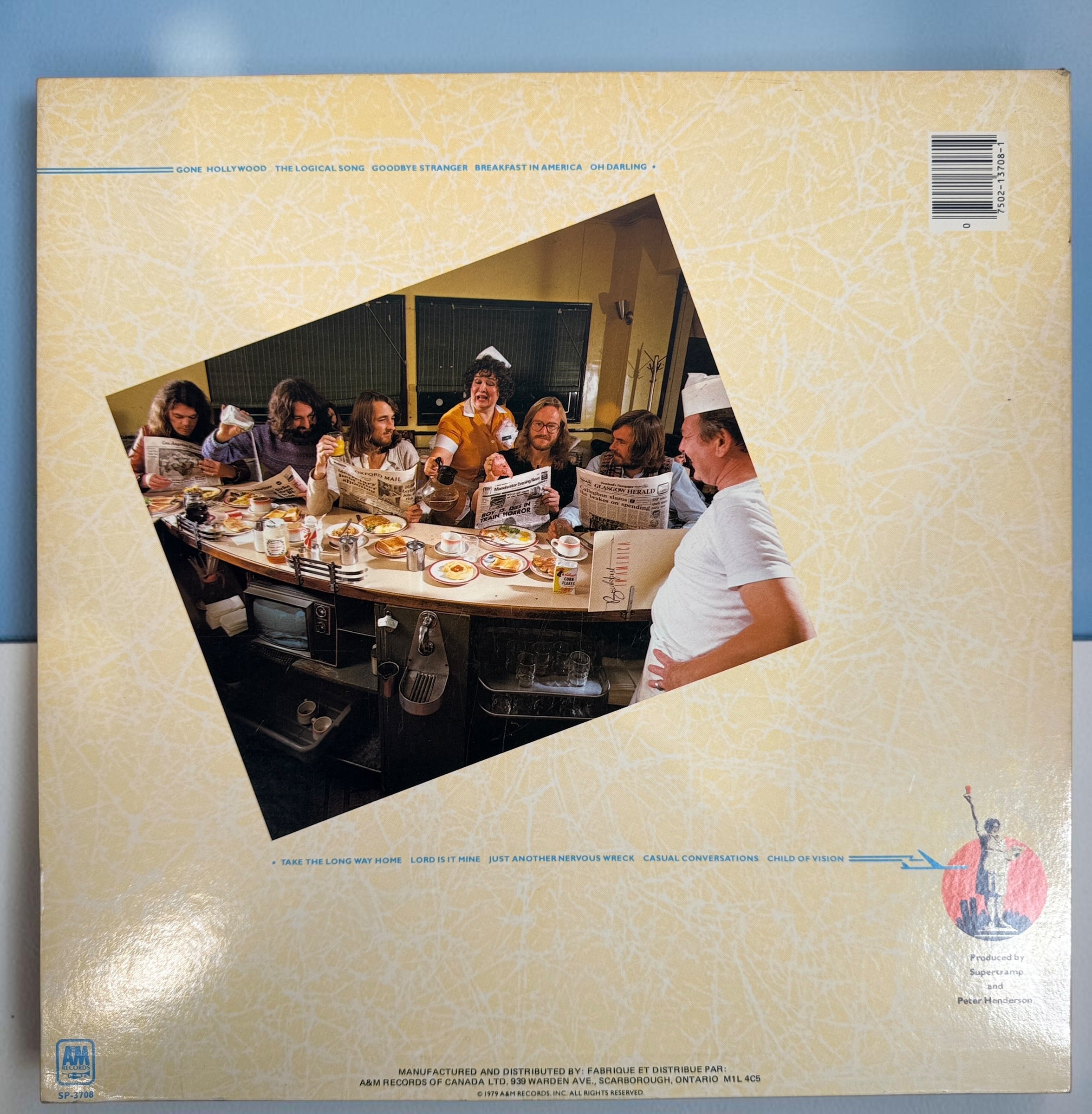 Supertramp's Breakfast in America (1979) Canadian vinyl LP on A&M Records SP-3708. Original lyric sleeve included. Vintage classic rock record.
