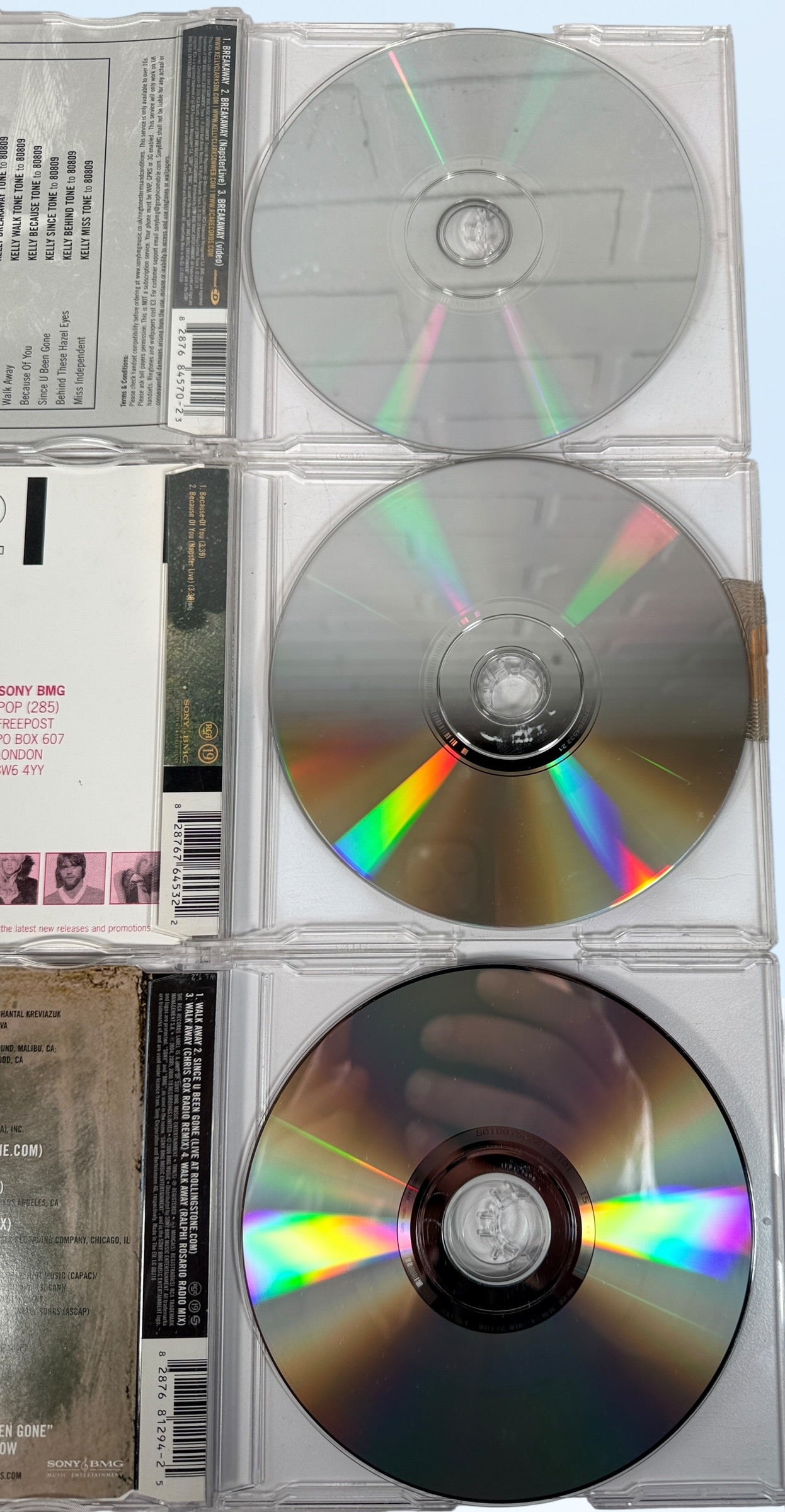 Kelly Clarkson Breakaway era CD singles lot including Breakaway, Because of You and Walk Away. Original Sony BMG releases with remixes and bonus tracks.