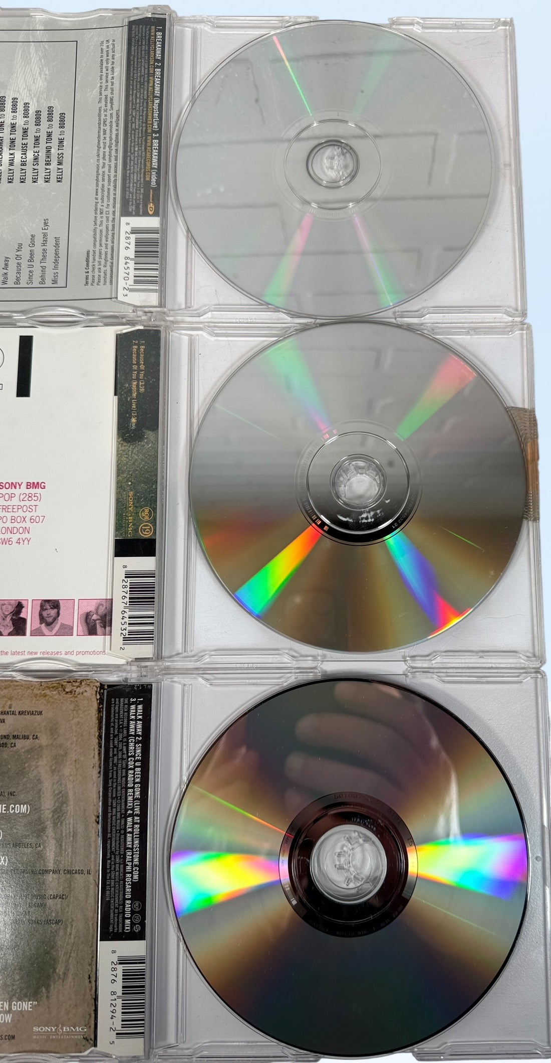 Kelly Clarkson Breakaway era CD singles lot including Breakaway, Because of You and Walk Away. Original Sony BMG releases with remixes and bonus tracks.