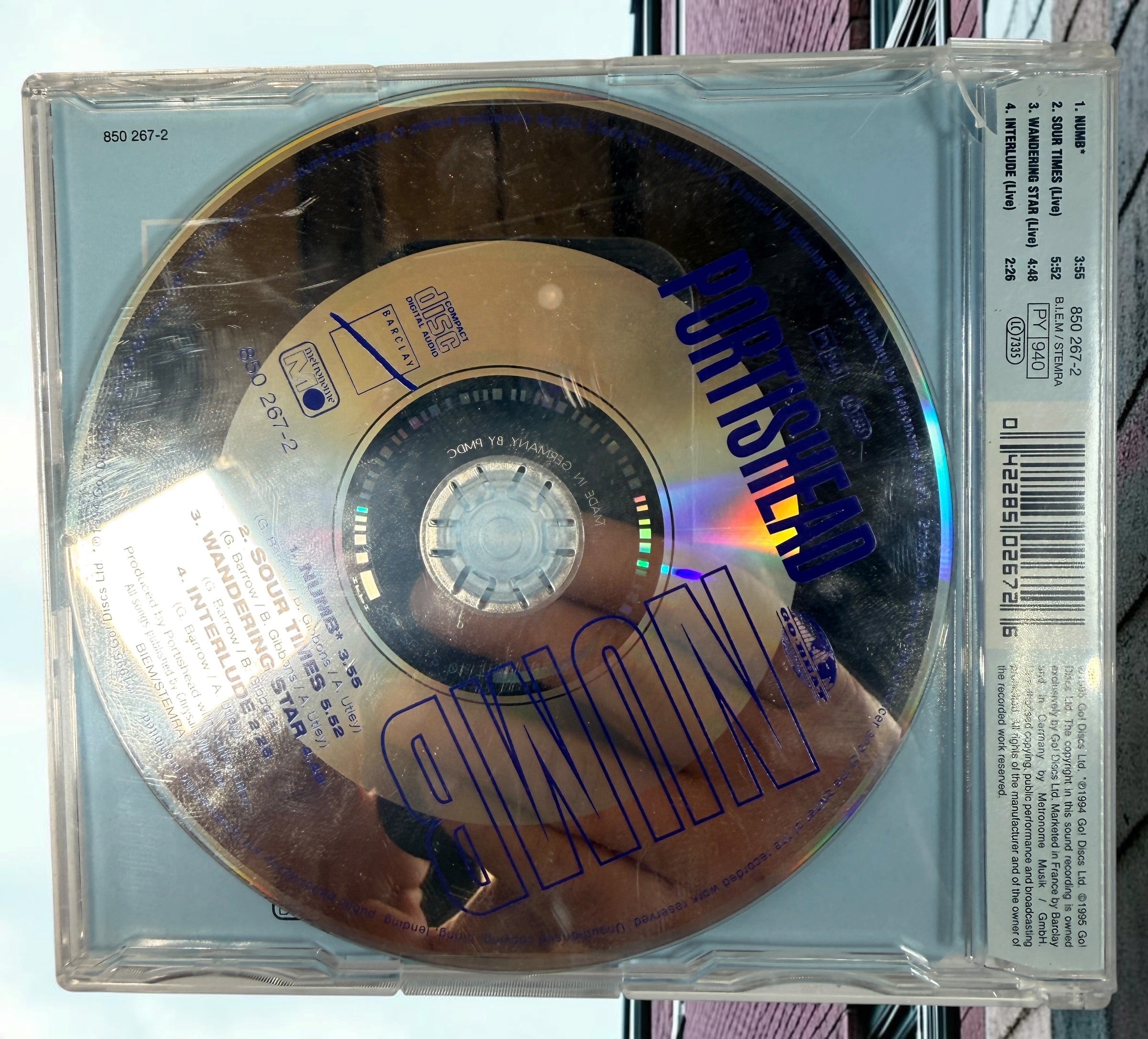 Portishead Numb 1995 European CD maxi-single with 3 live tracks. Original Go! Discs release, catalogue 850 267-2. Collectible trip-hop CD.