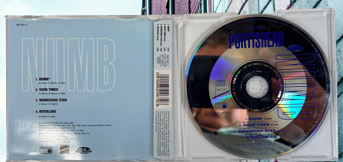 Portishead Numb 1995 European CD maxi-single with 3 live tracks. Original Go! Discs release, catalogue 850 267-2. Collectible trip-hop CD.