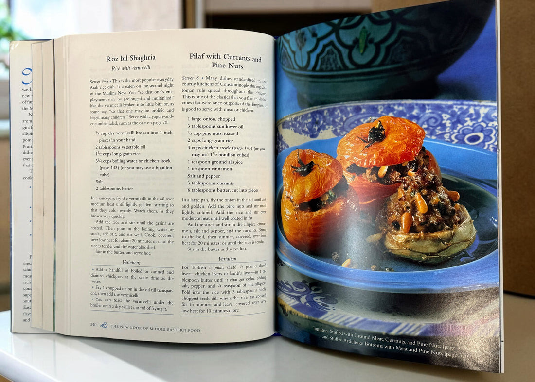Claudia Roden's The New Book of Middle Eastern Food. Revised hardcover cookbook, 2012 printing, with traditional recipes and colour photography.
