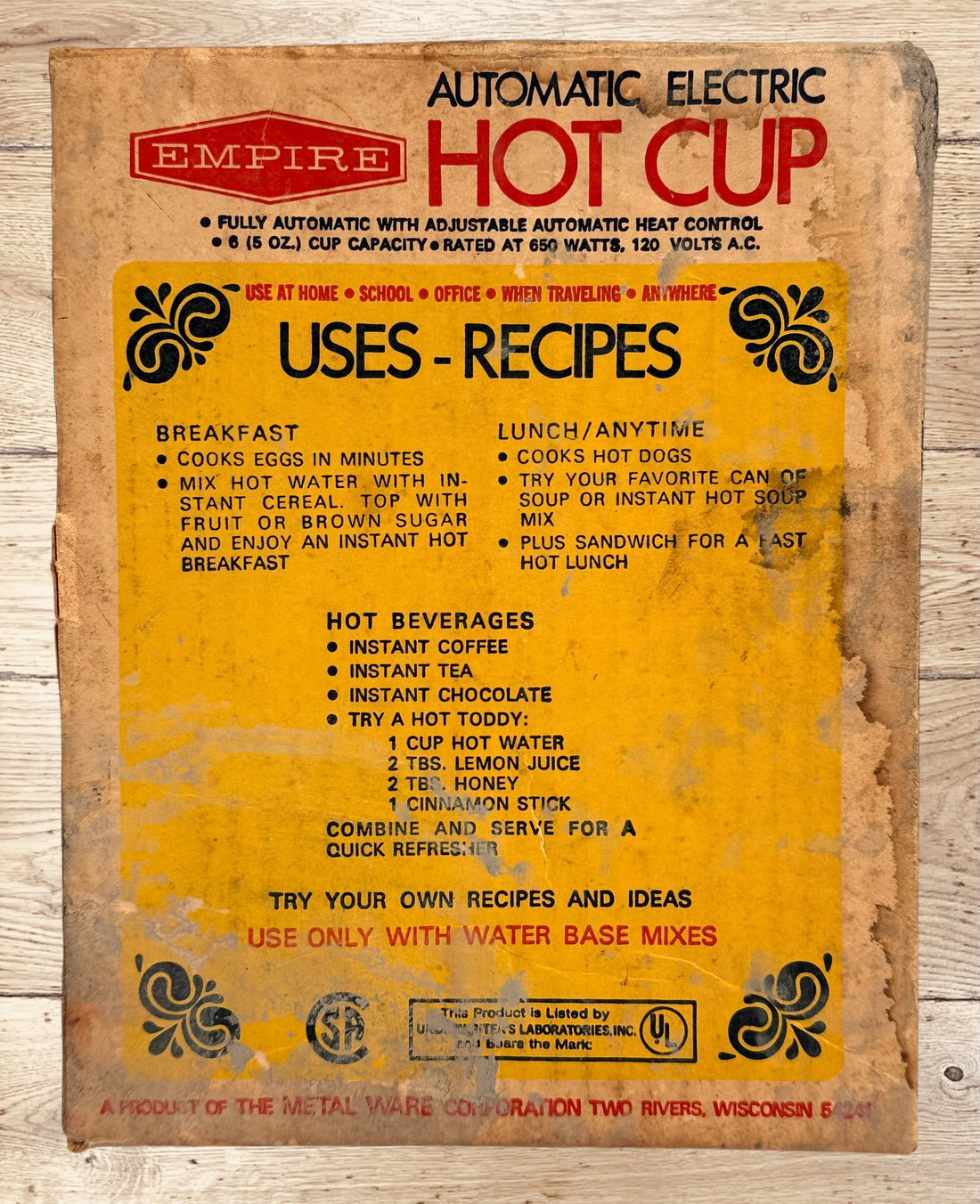 
Vintage Empire Electric Hot Cup Model 1088 avocado green travel kettle with original box. Mid-century portable electric water heater by Metal Ware Corp.