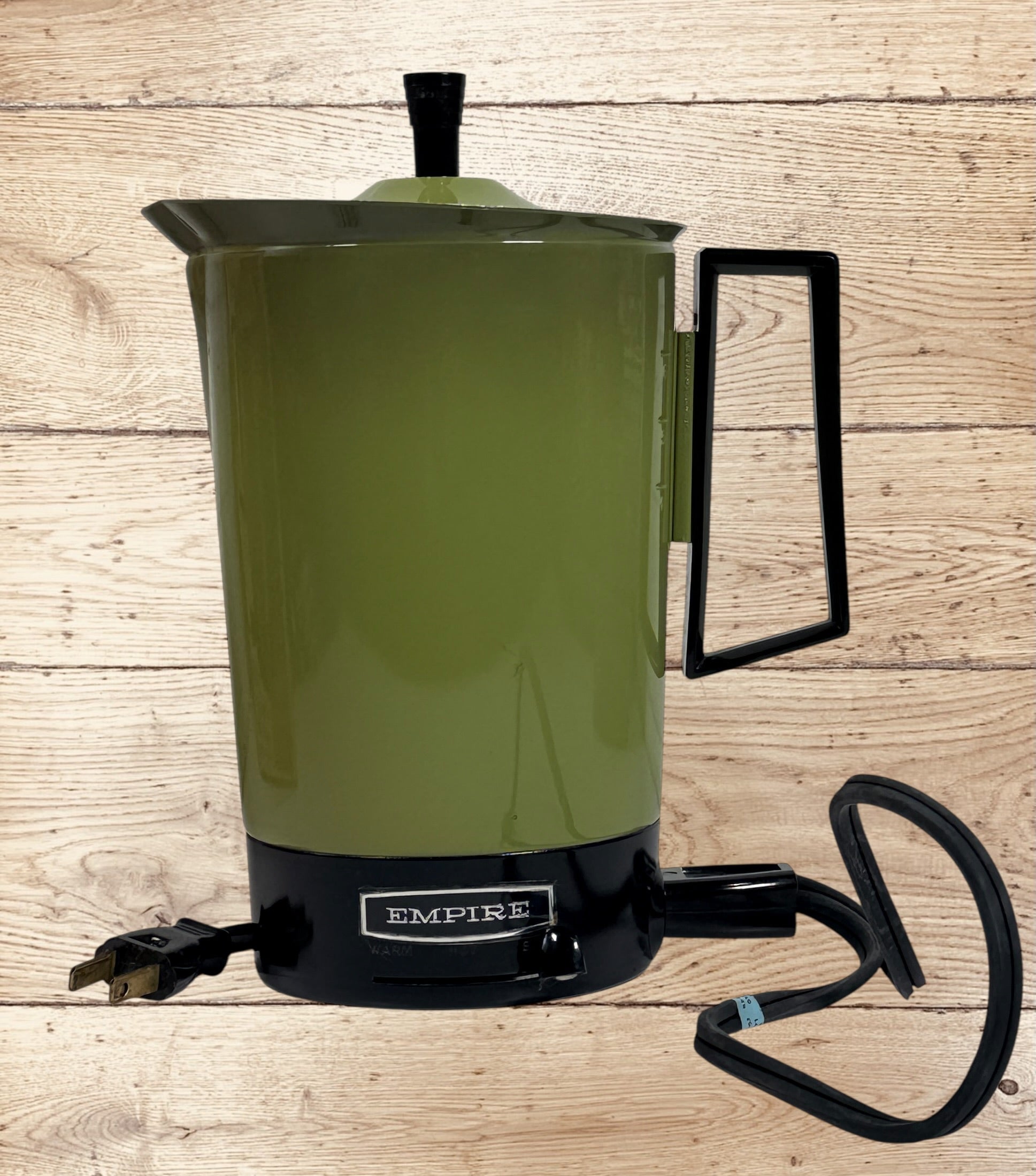 
Vintage Empire Electric Hot Cup Model 1088 avocado green travel kettle with original box. Mid-century portable electric water heater by Metal Ware Corp.