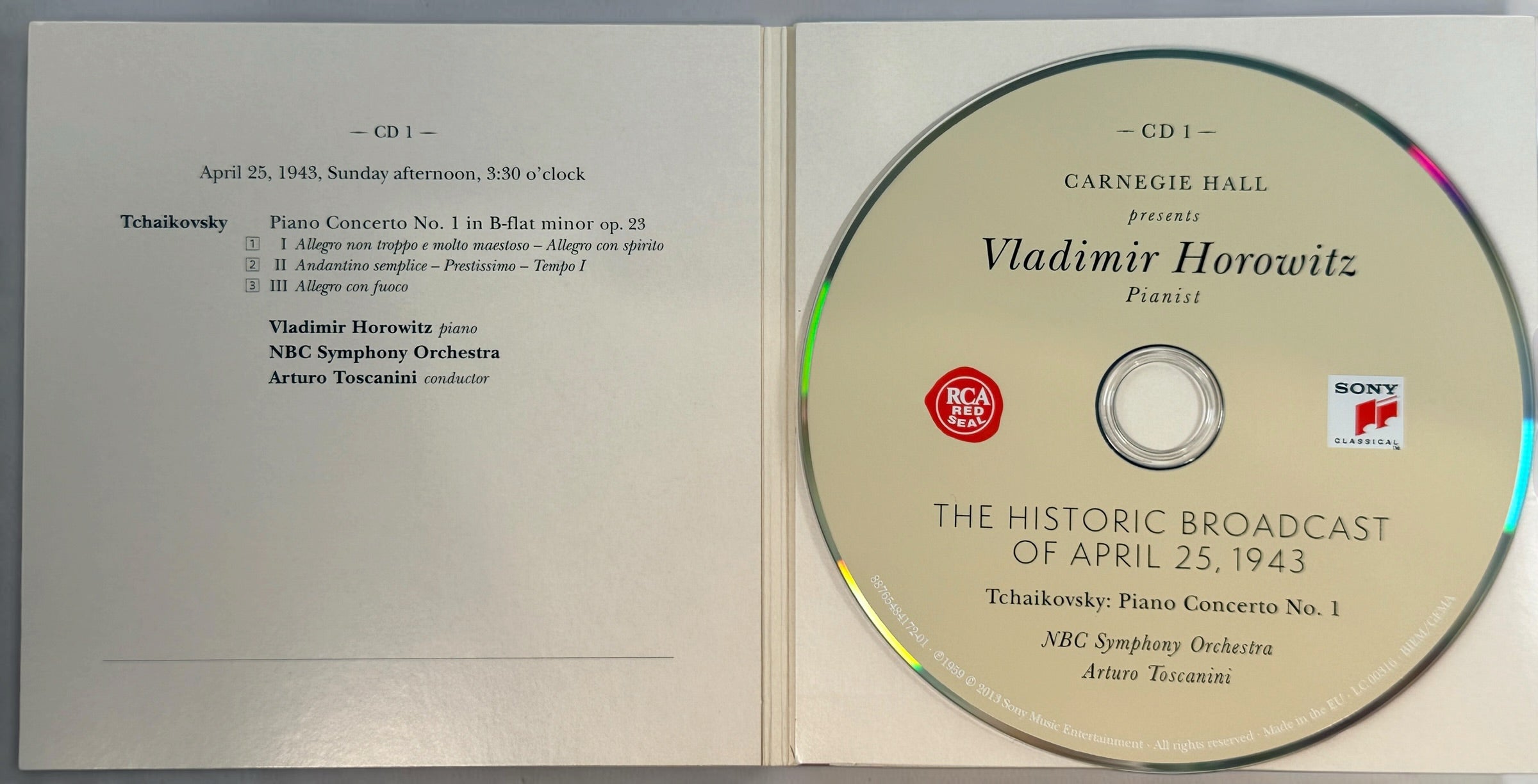 An open CD case showing a vintage audio release of Vladimir Horowitz's piano concerto on Carnegie Hall. The left page contains printed track information, and the right side holds the CD disc with the title 'The Historic Broadcast of April 25, 1943' and Sony and NBC logos.