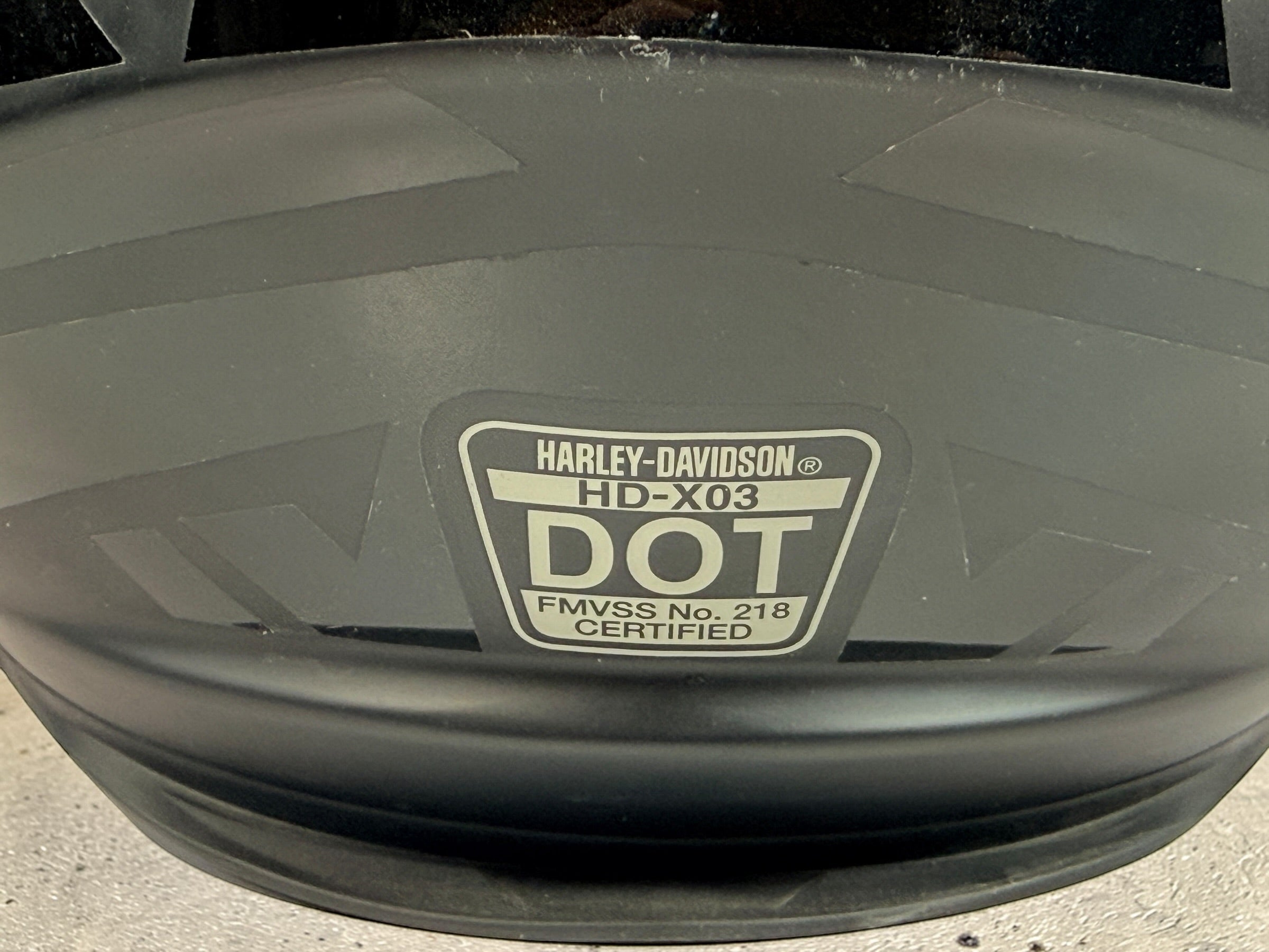 Harley-Davidson HD-X03 full-face motorcycle helmet, matte black XL with clear visor and Bluetooth module. DOT certified riding helmet in very good condition.